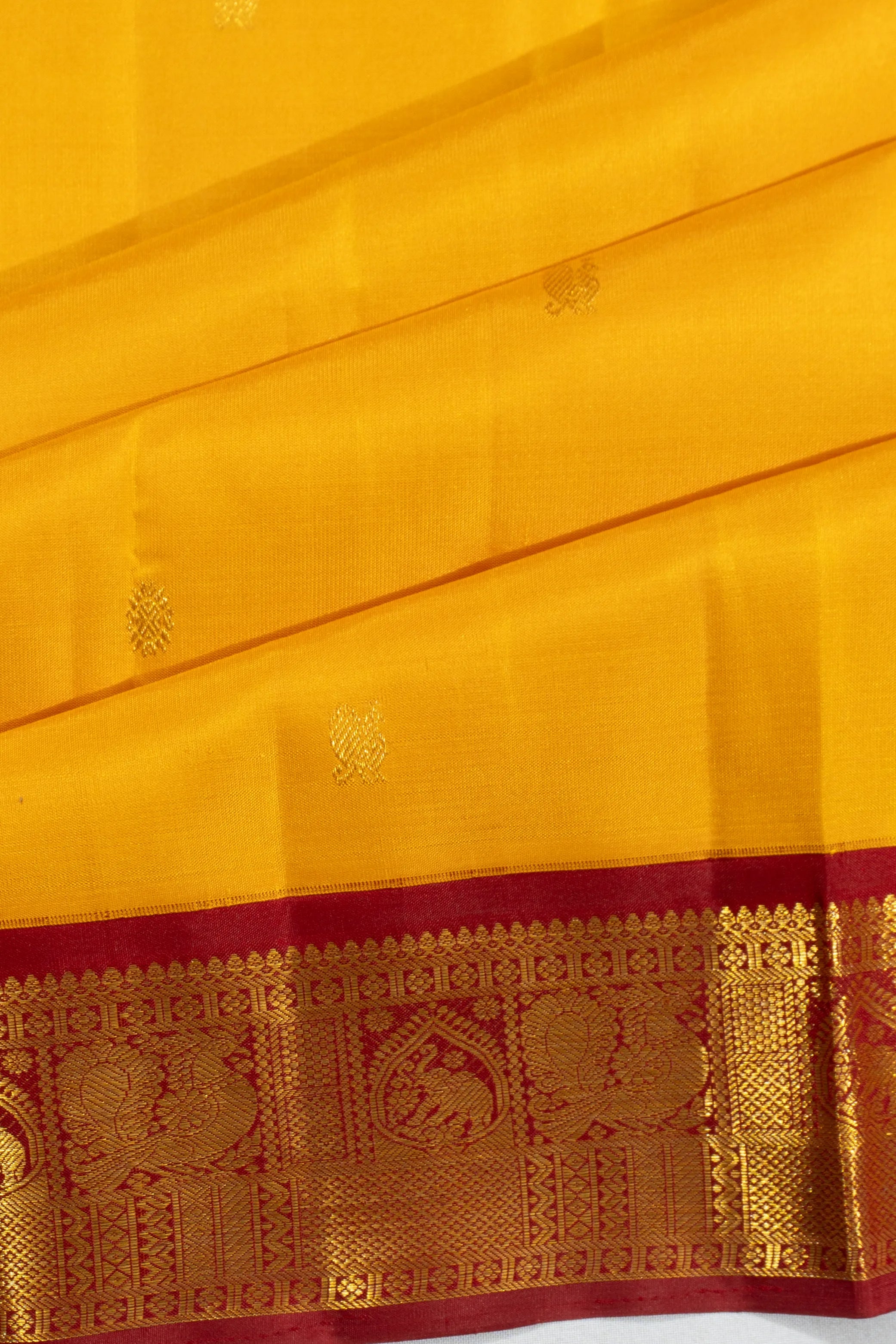 Kanchipuram Silk Butta Yellow Saree With Ganga Jamuna Border