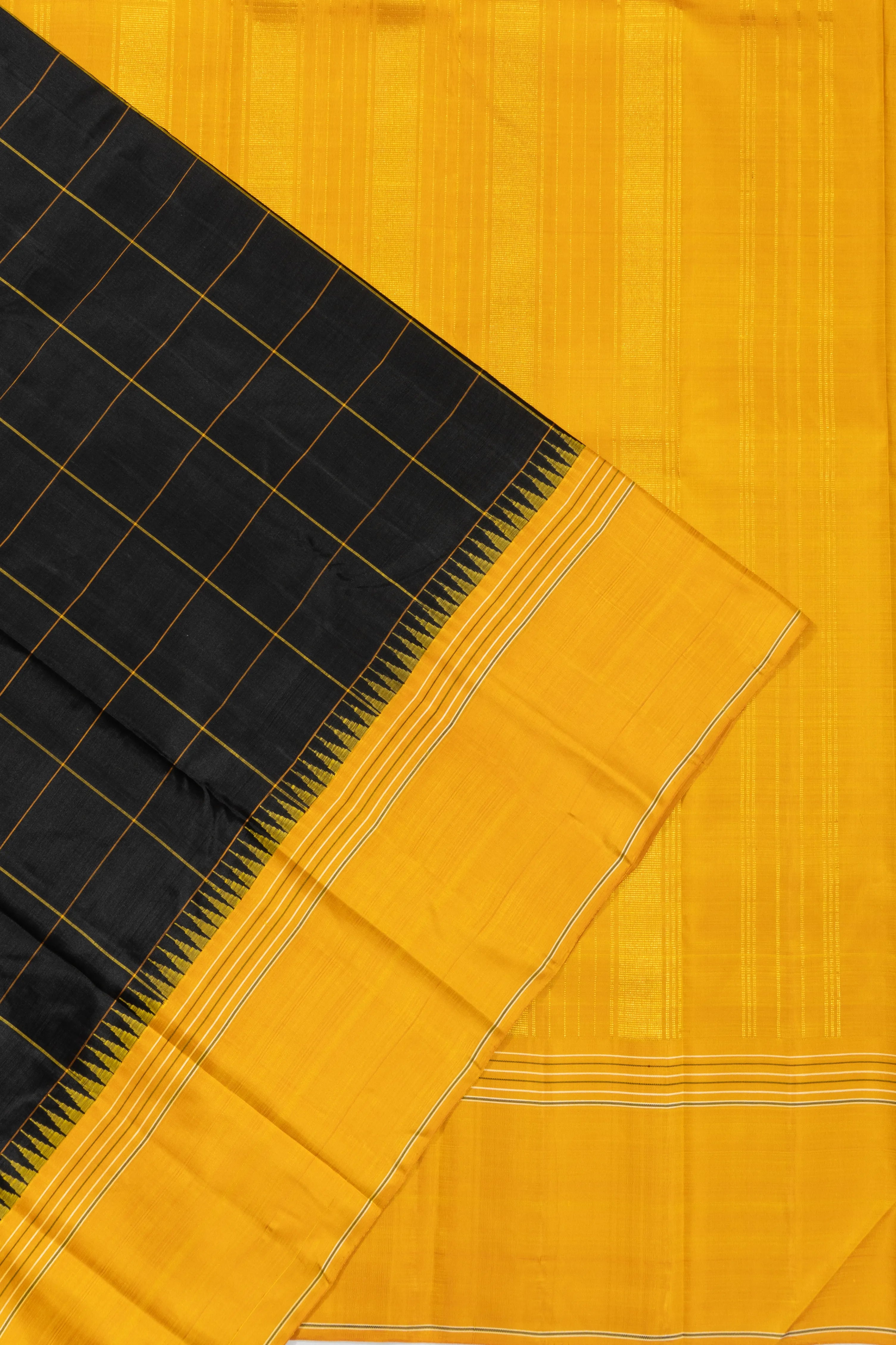 Kanchipuram Silk Checks Black Saree With Ganga Jamuna Border