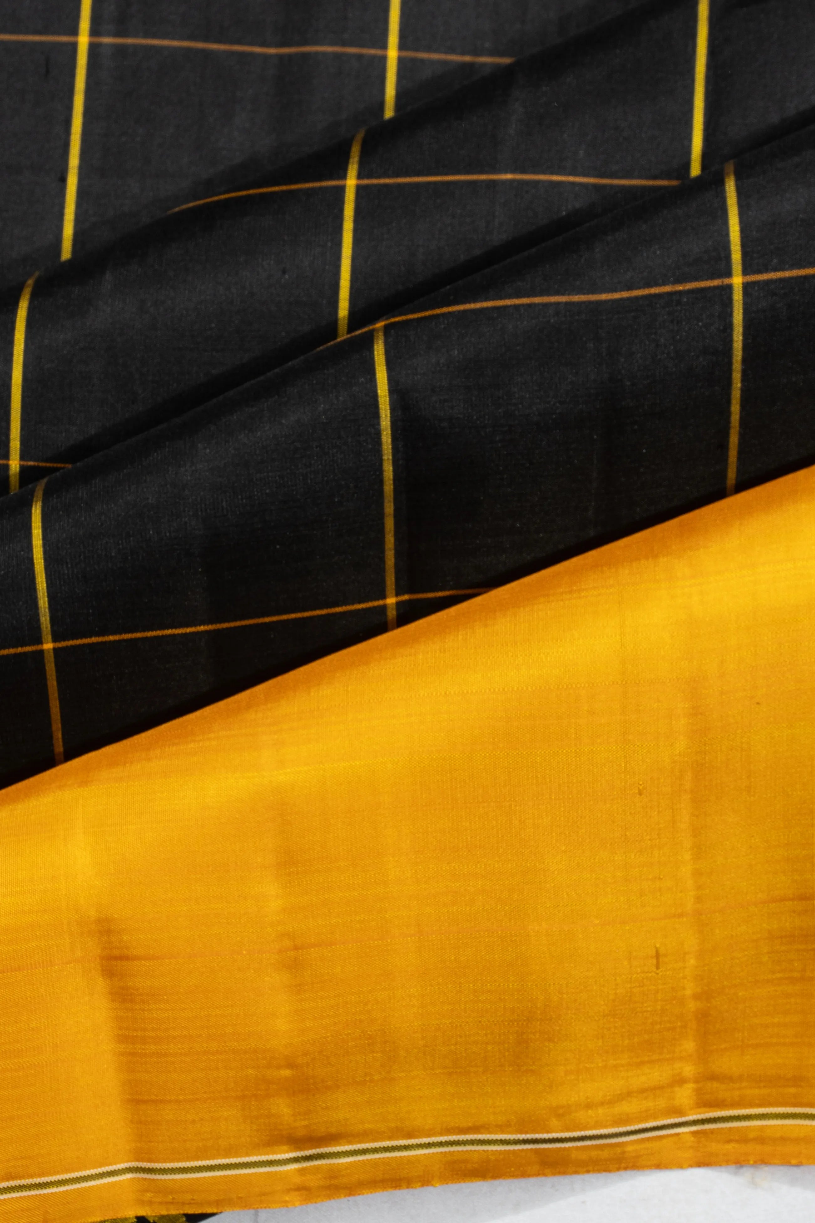 Kanchipuram Silk Checks Black Saree With Ganga Jamuna Border