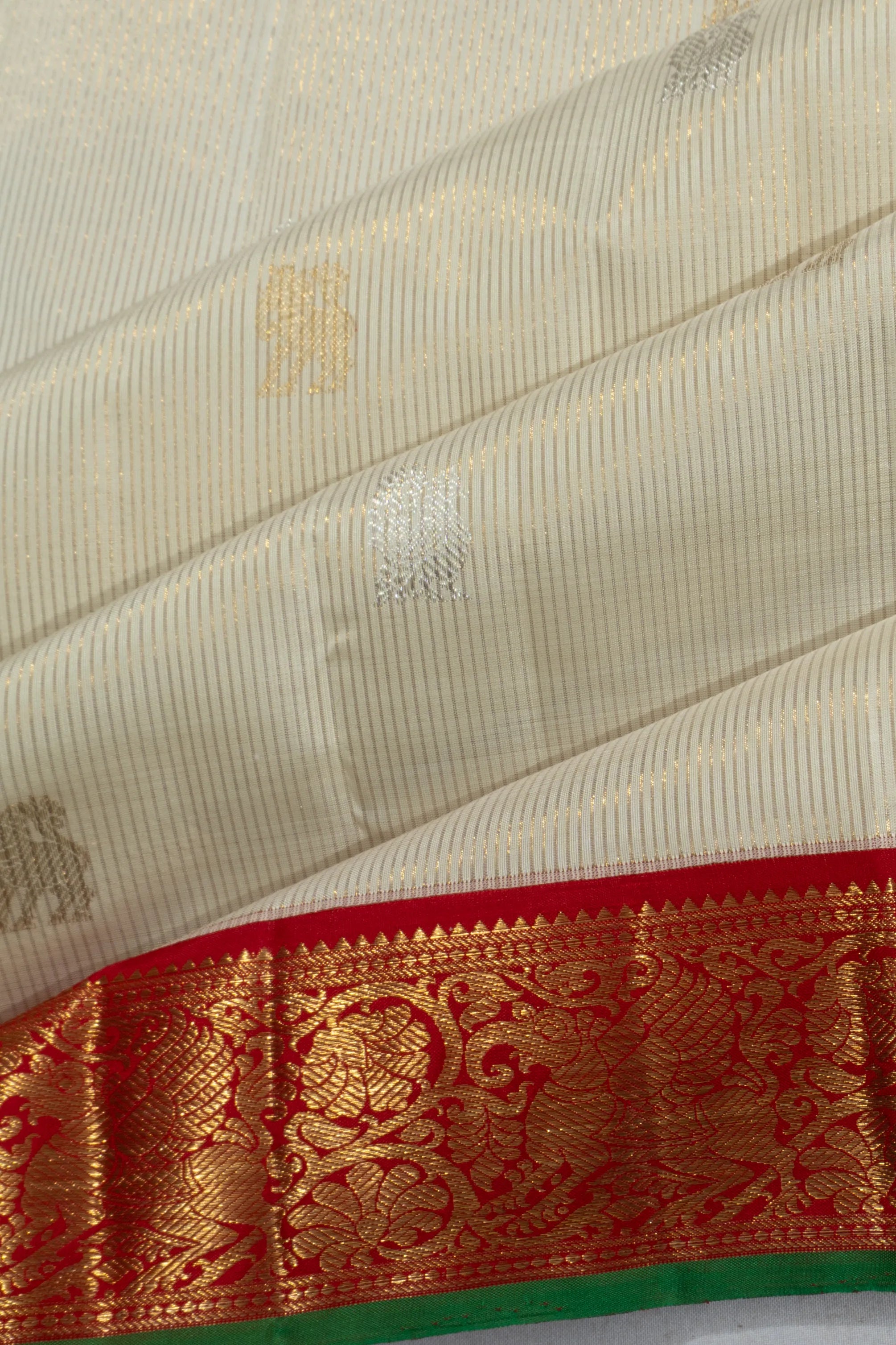 Kanchipuram Silk Vertical Lines And Butta Cream Saree