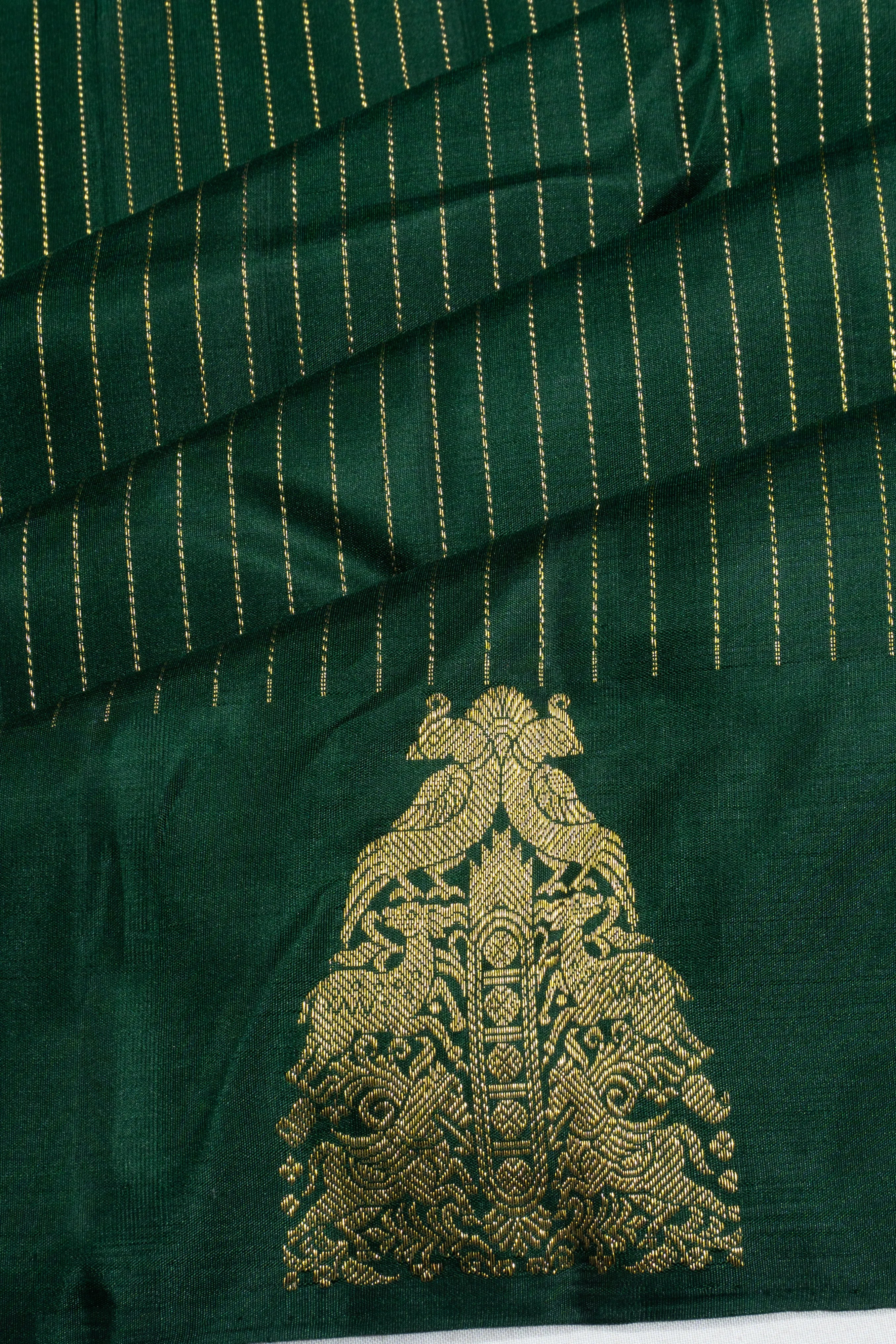 Taranga Kanchi Silk Vertical Lines Bottle Green Saree