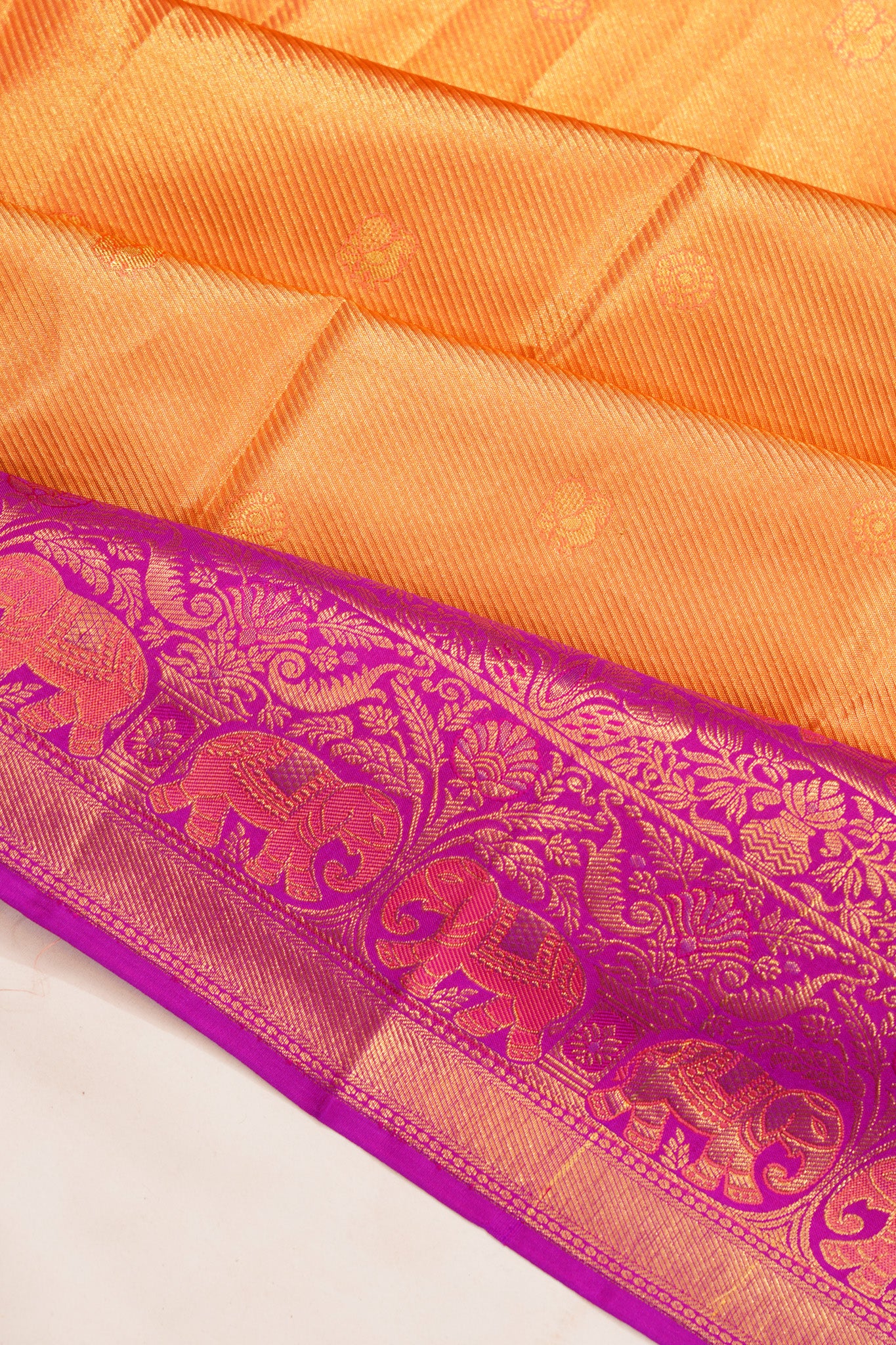 Taranga Kanchi Silk Tissue Butta Gold Saree