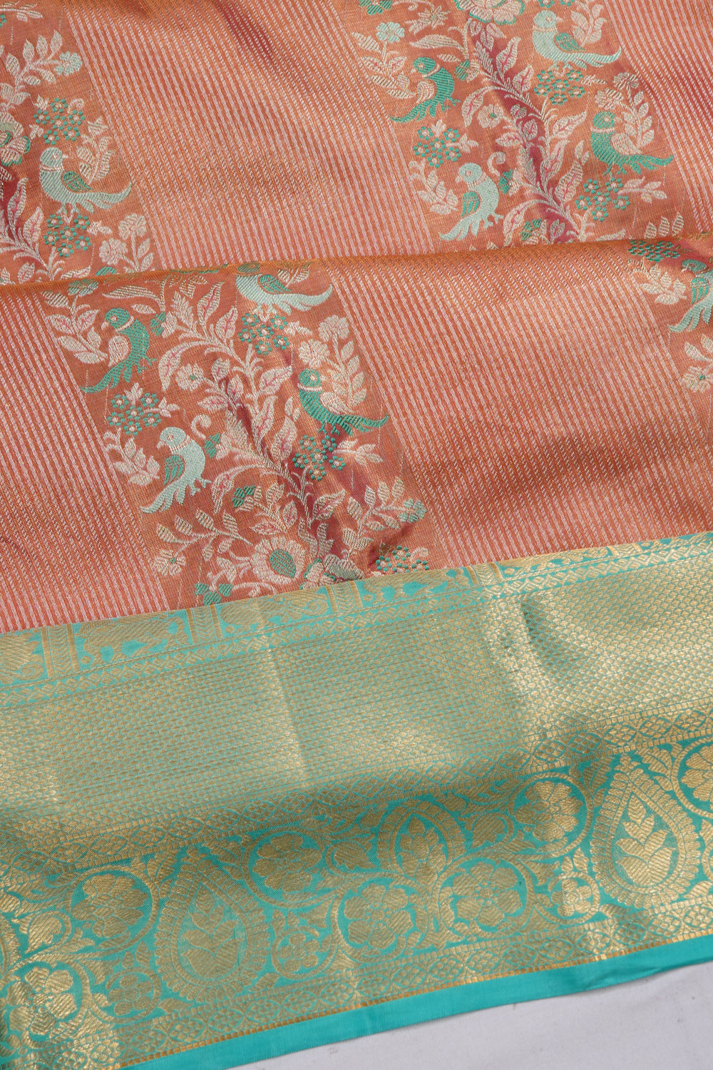 Taranga Kanchi Silk Tissue Brocade Peach Saree