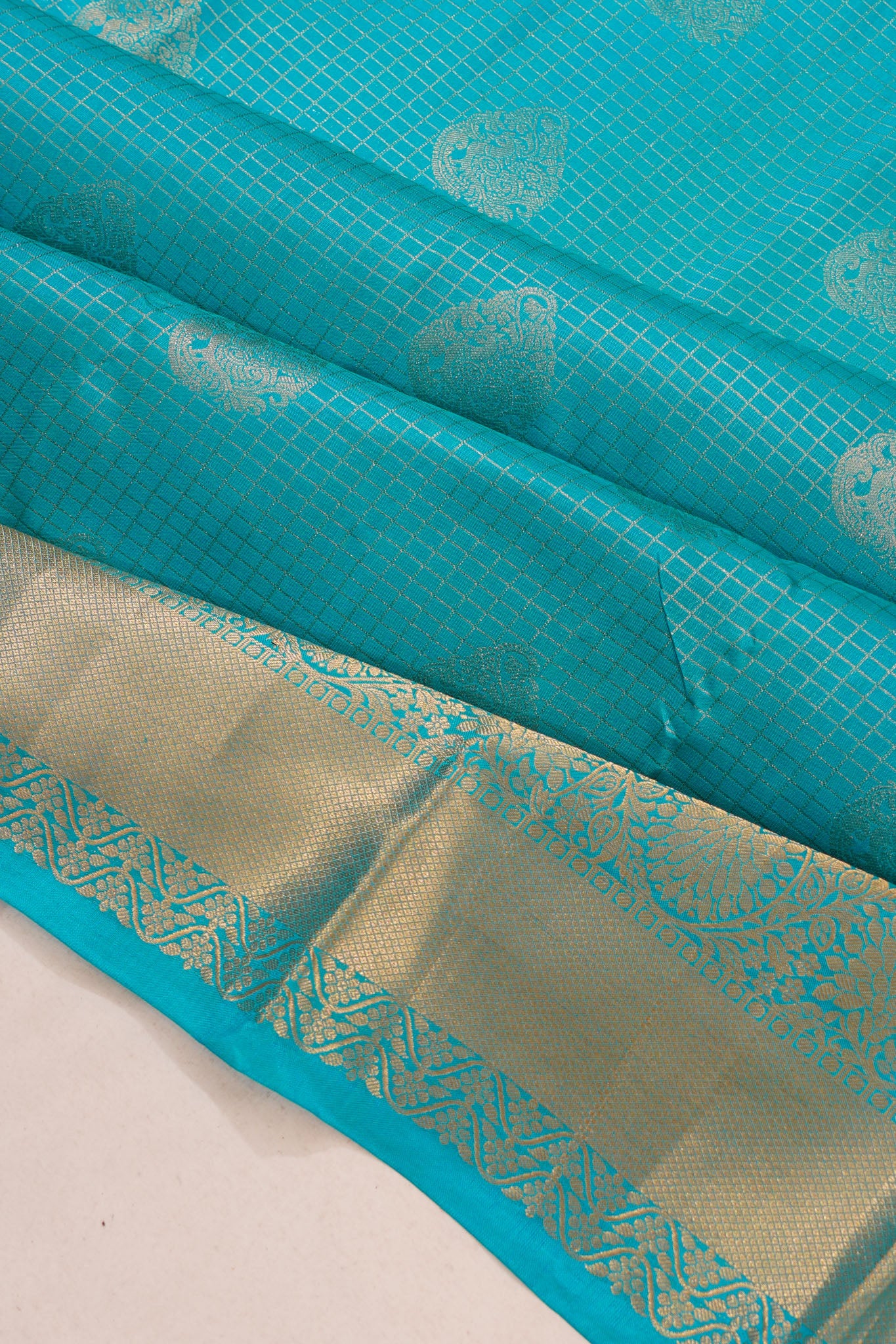 Taranga Kanchi Silk Checks And Butta Sky Blue Saree