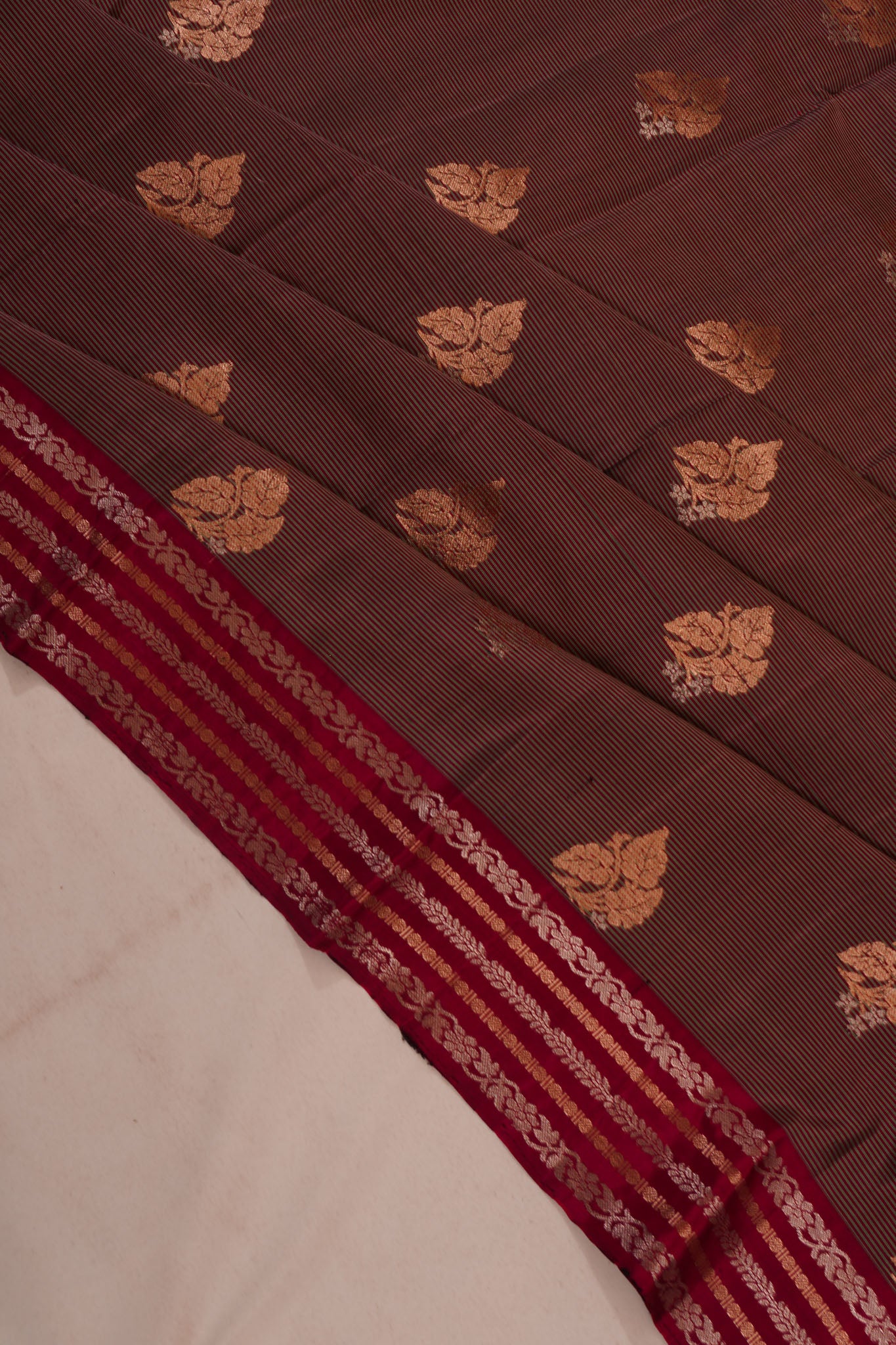 Taranga Kanchi Silk Oosi Lines And Butta Maroon Saree