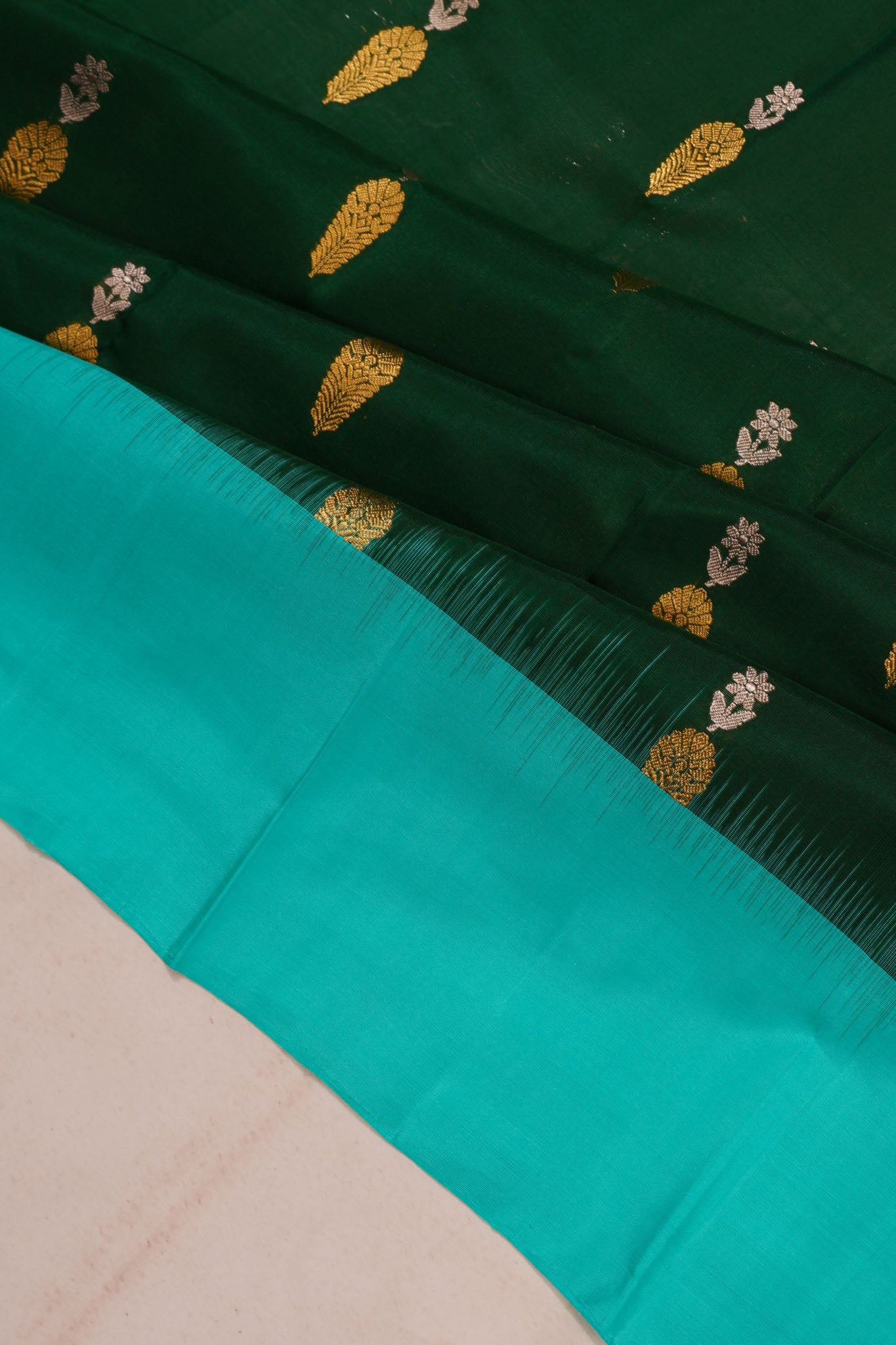 Taranga Kanchi Silk Butta dark Green saree