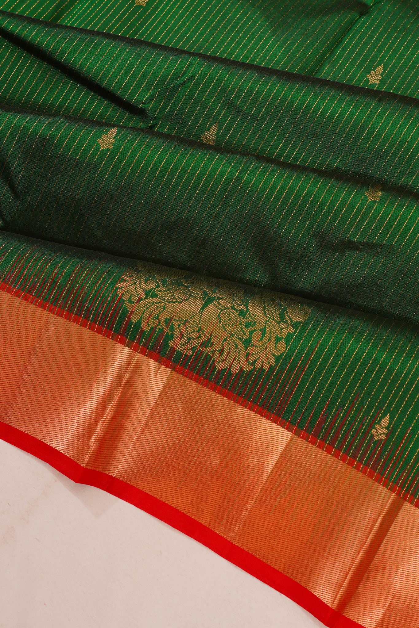 Taranga Kanchi Silk Vertical Lines And Butta Dark Green Saree