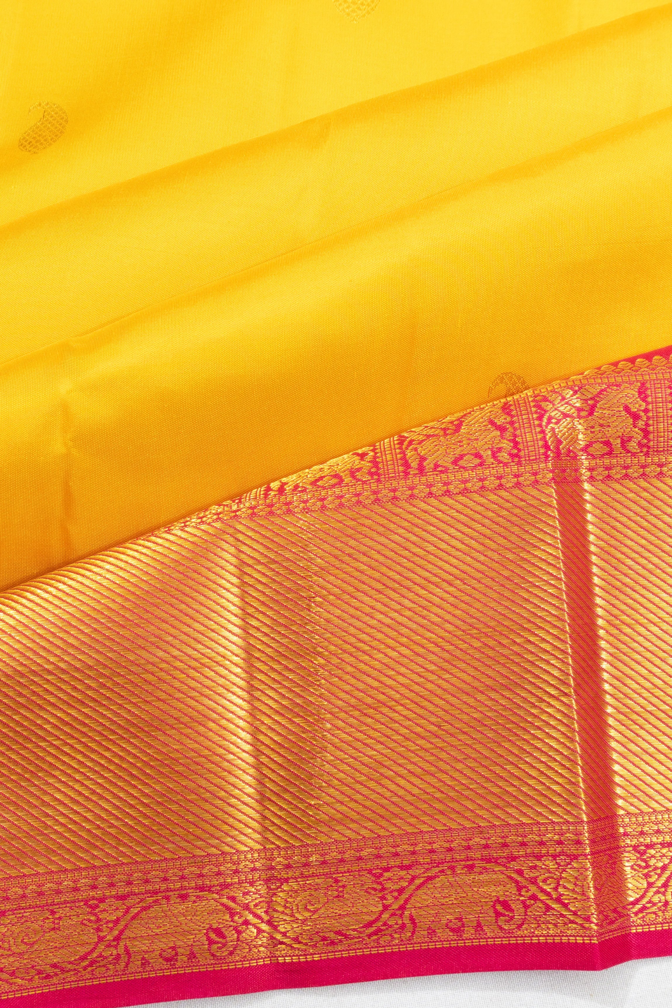 Classic Kanchipuram Silk Butta Yellow Saree With Ganga Jamuna Border