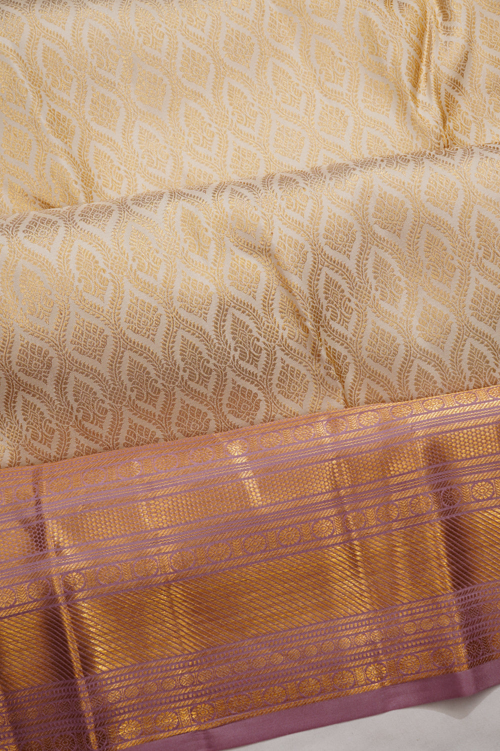 Taranga Kanchi Silk Brocade Cream Saree