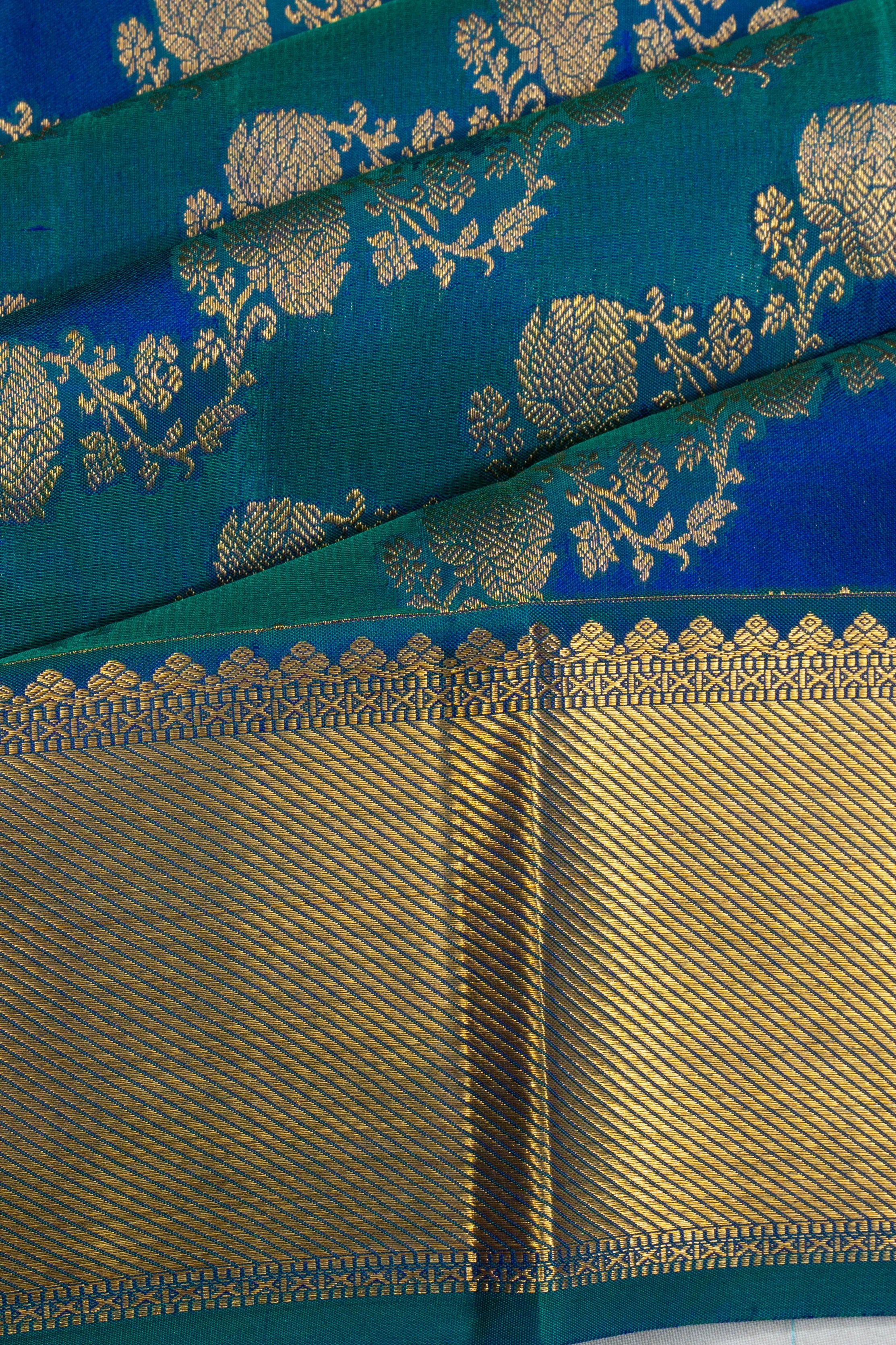 Kanchipuram Silk Leheriya Jaal Blue And Sea Green Saree