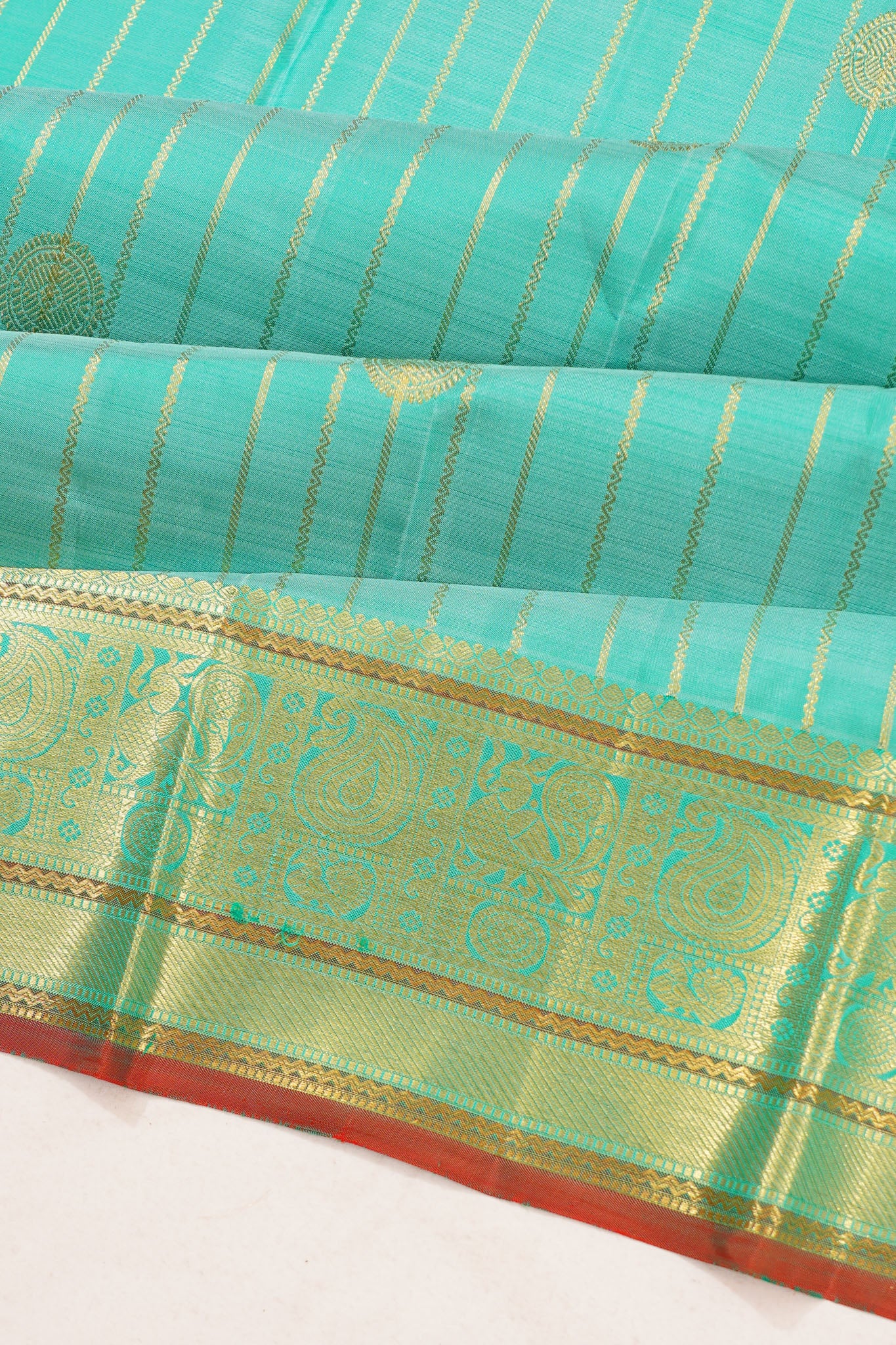 Taranga Kanchi Silk Vertical Iines And Butta Sea Blue Saree