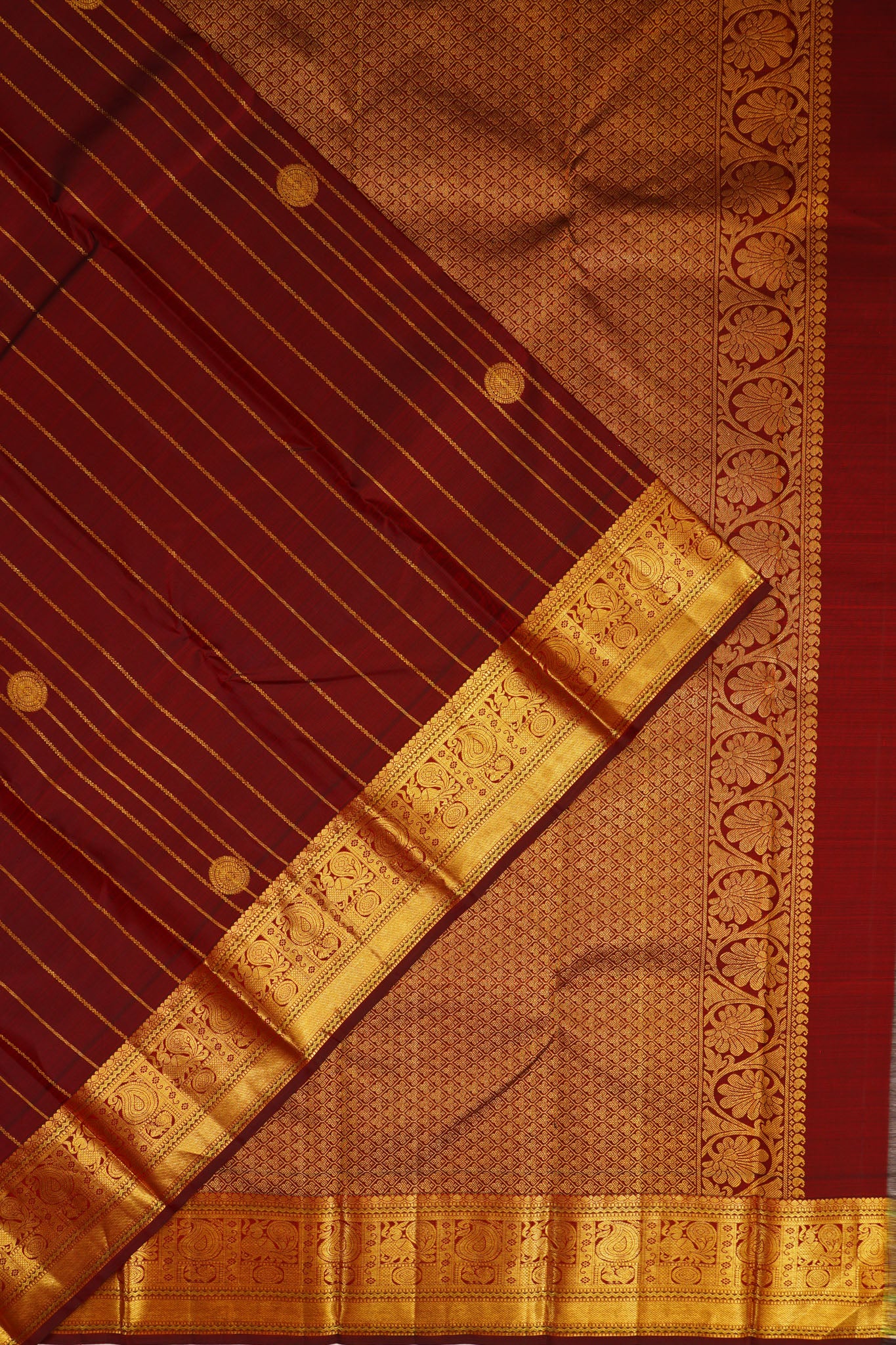 Taranga Kanchi Silk Vertical Iines And Butta Brown Saree