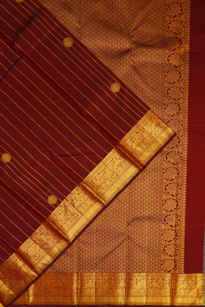 Taranga Kanchi Silk Vertical Iines And Butta Brown Saree