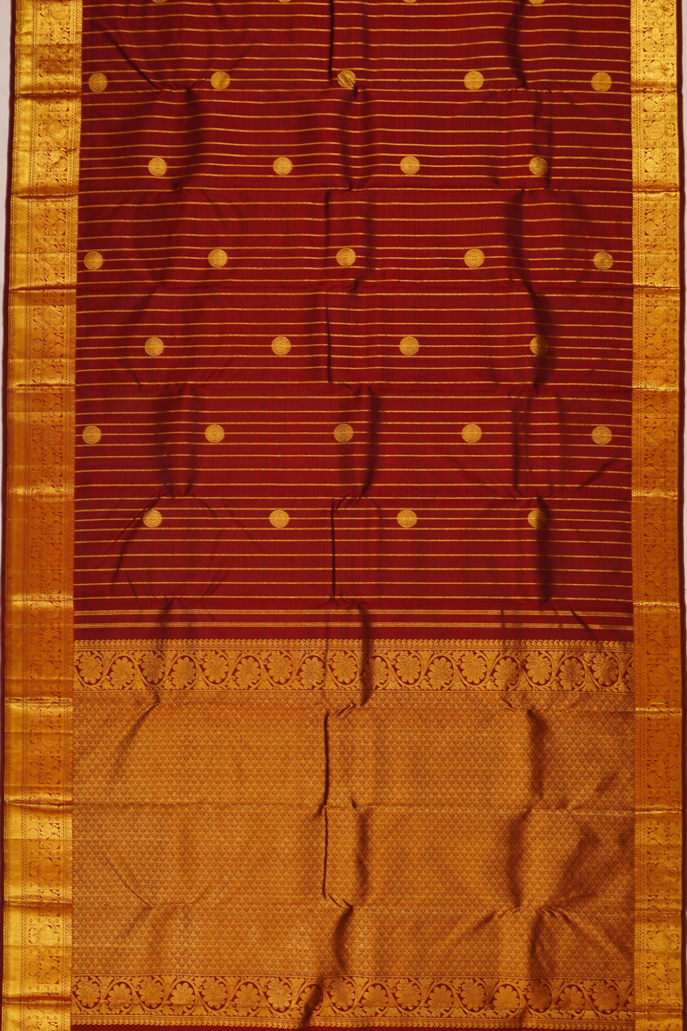 Taranga Kanchi Silk Vertical Iines And Butta Brown Saree