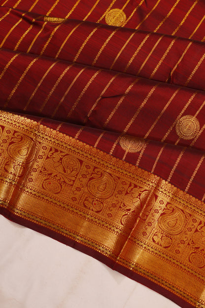 Taranga Kanchi Silk Vertical Iines And Butta Brown Saree