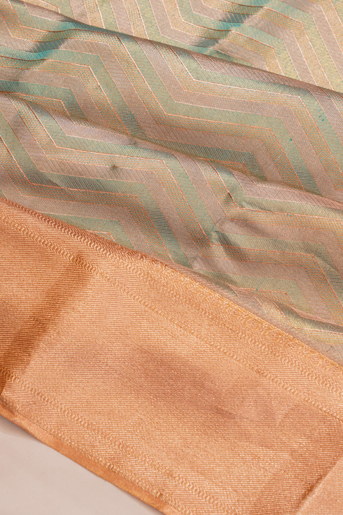 Taranga Kanchi Silk Tissue Zig Zag Lines Green Saree