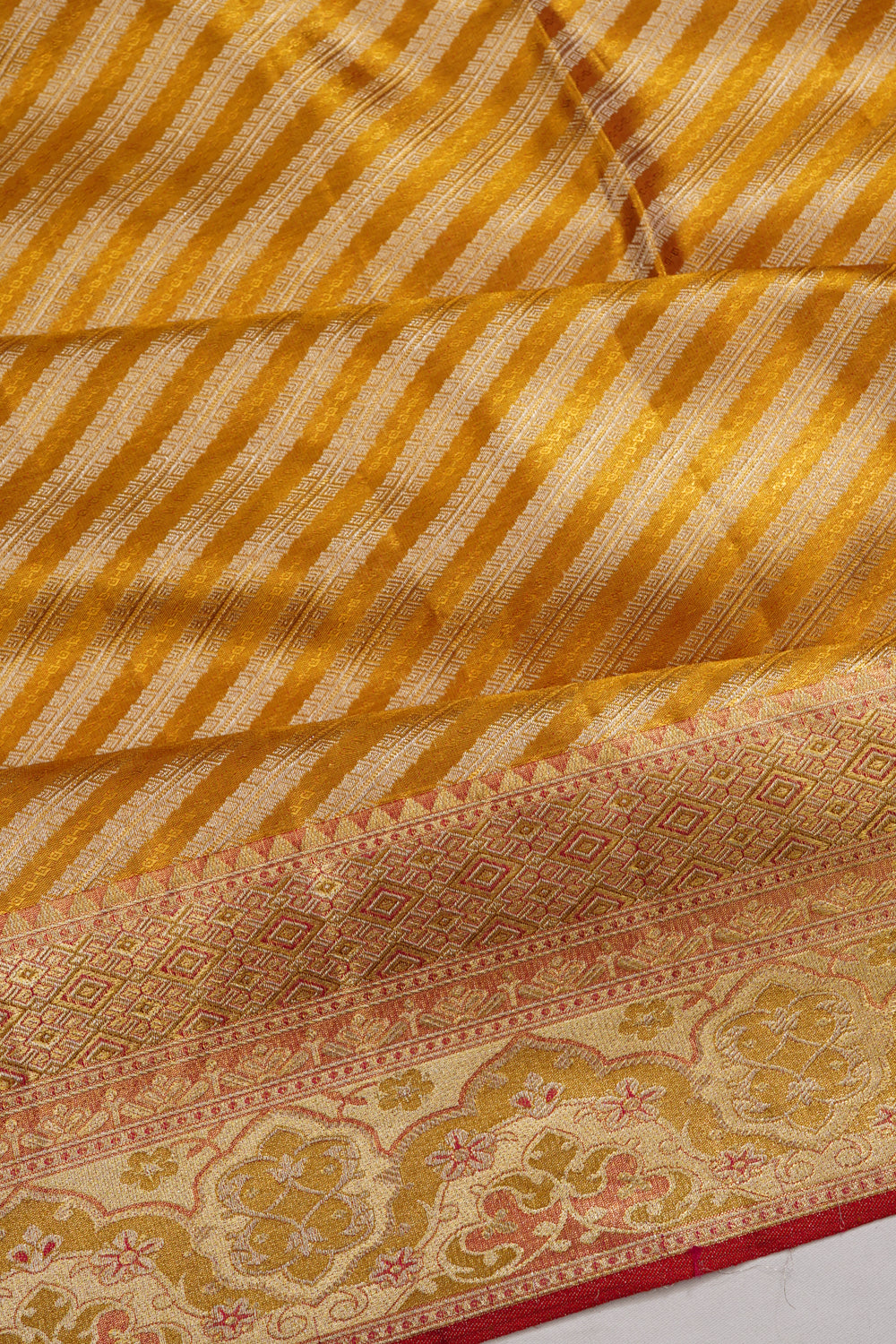 Kanchipuram Silk Tissue Diagonal Lines Gold Saree