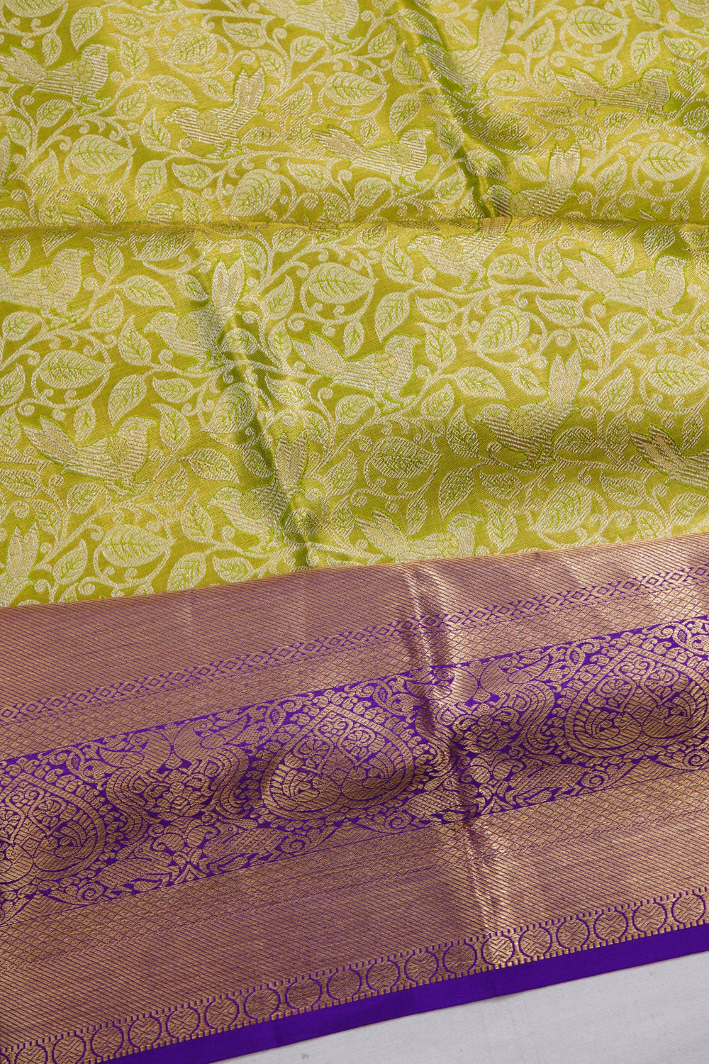 Taranga Kanchi Silk Tissue Brocade Green Saree