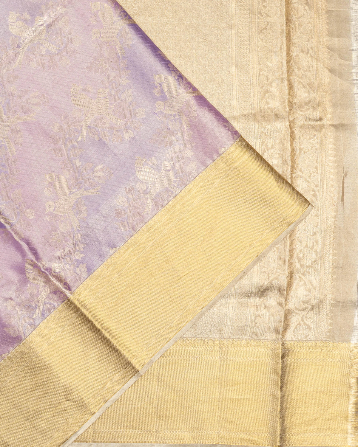 Taranga Kanchi Silk Tissue Brocade And Butta Lavender Saree