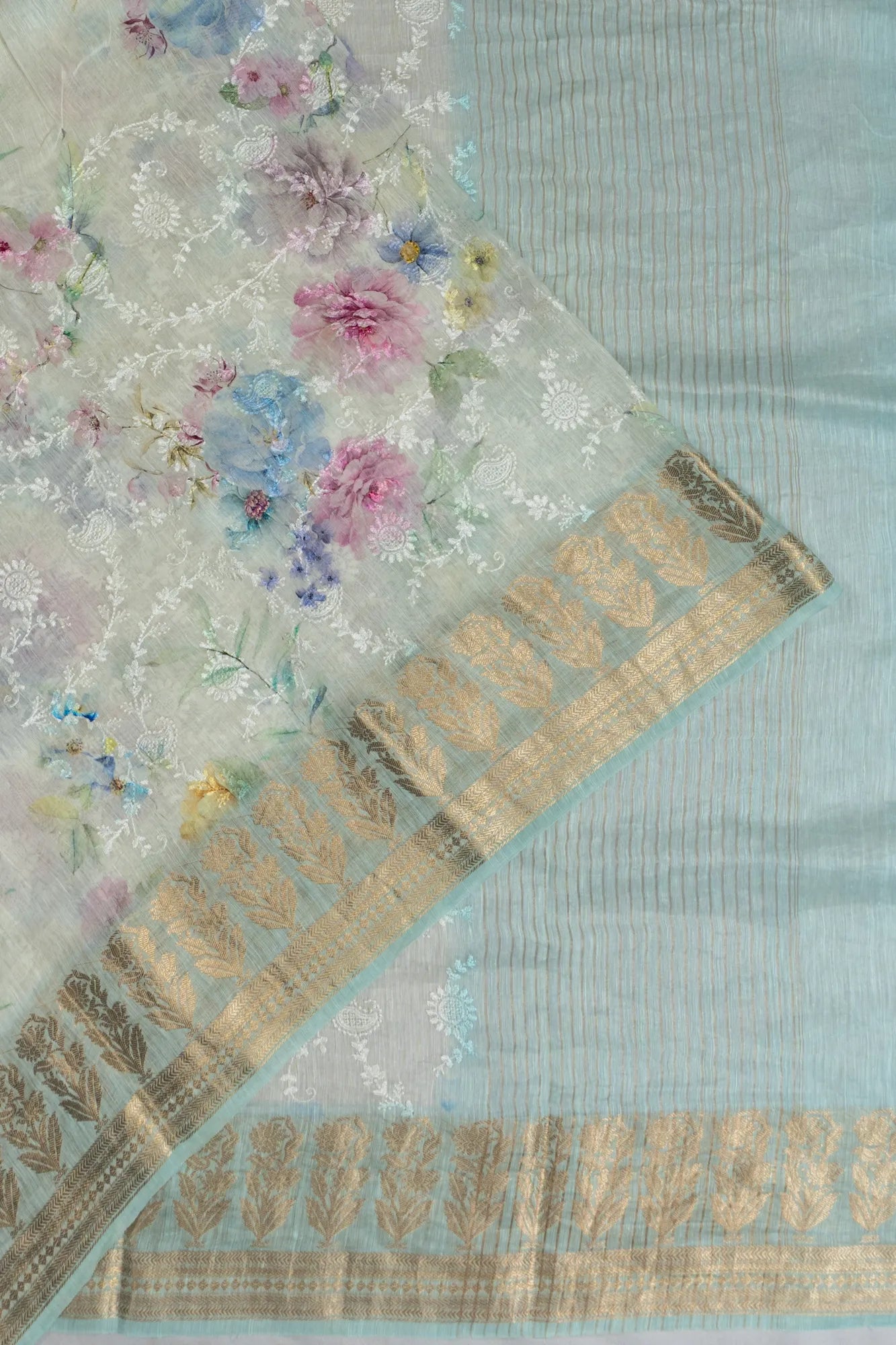 Linen Embroidery And Floral Printed White Saree