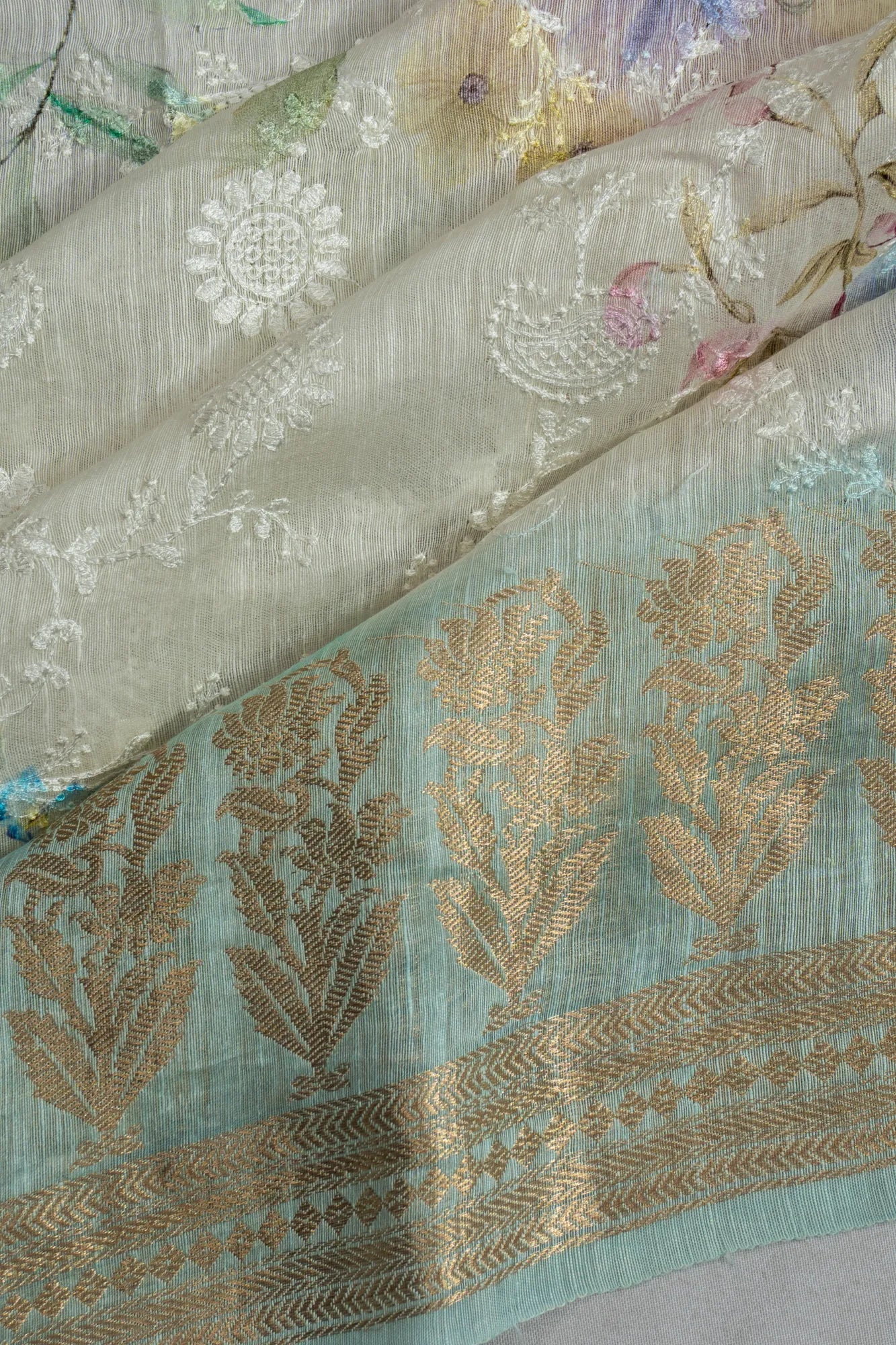 Linen Embroidery And Floral Printed White Saree
