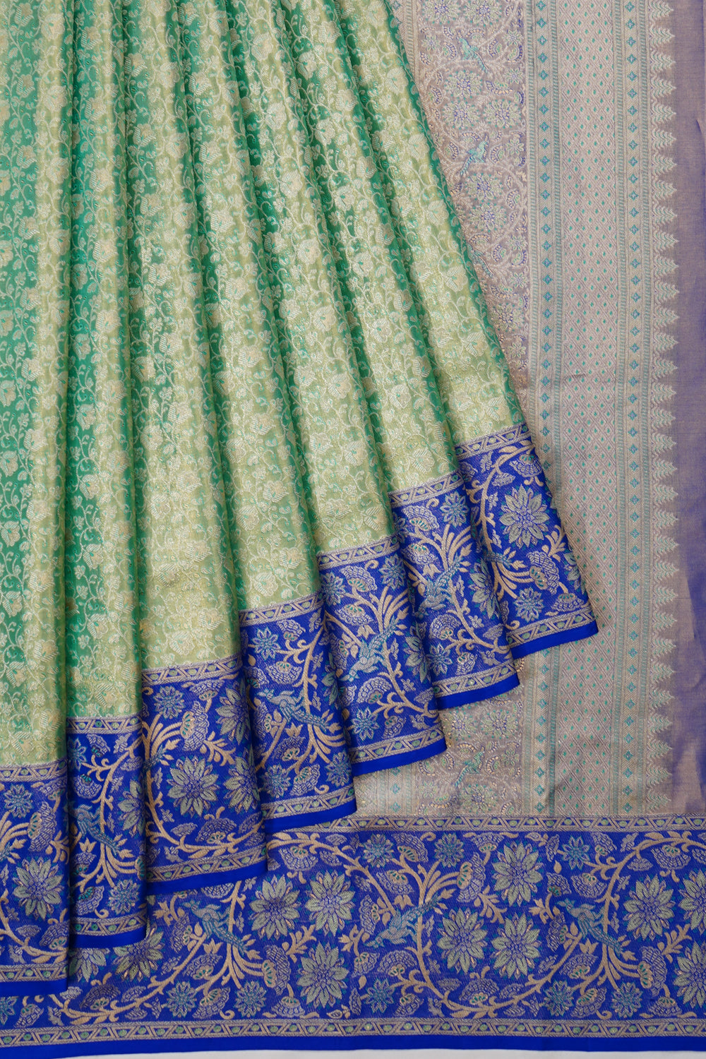 Taranga Kanchi Silk Tissue Brocade Green Saree