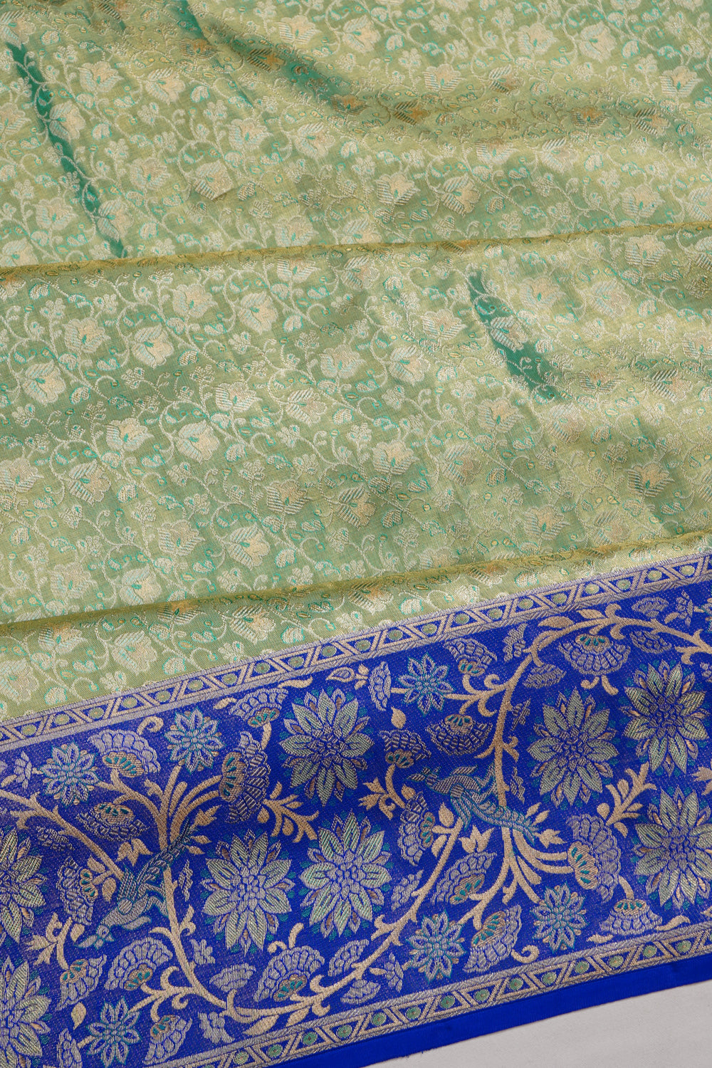 Taranga Kanchi Silk Tissue Brocade Green Saree