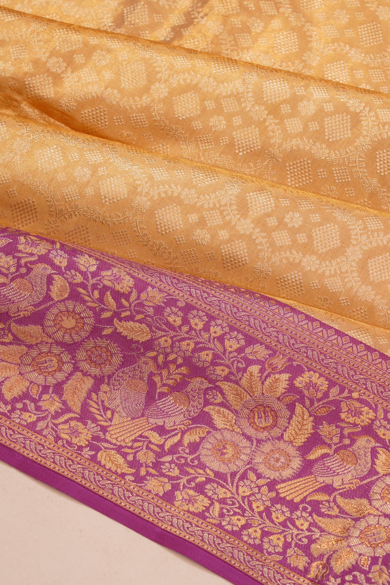 Taranga Kanchi Silk Tissue Brocade Gold Saree