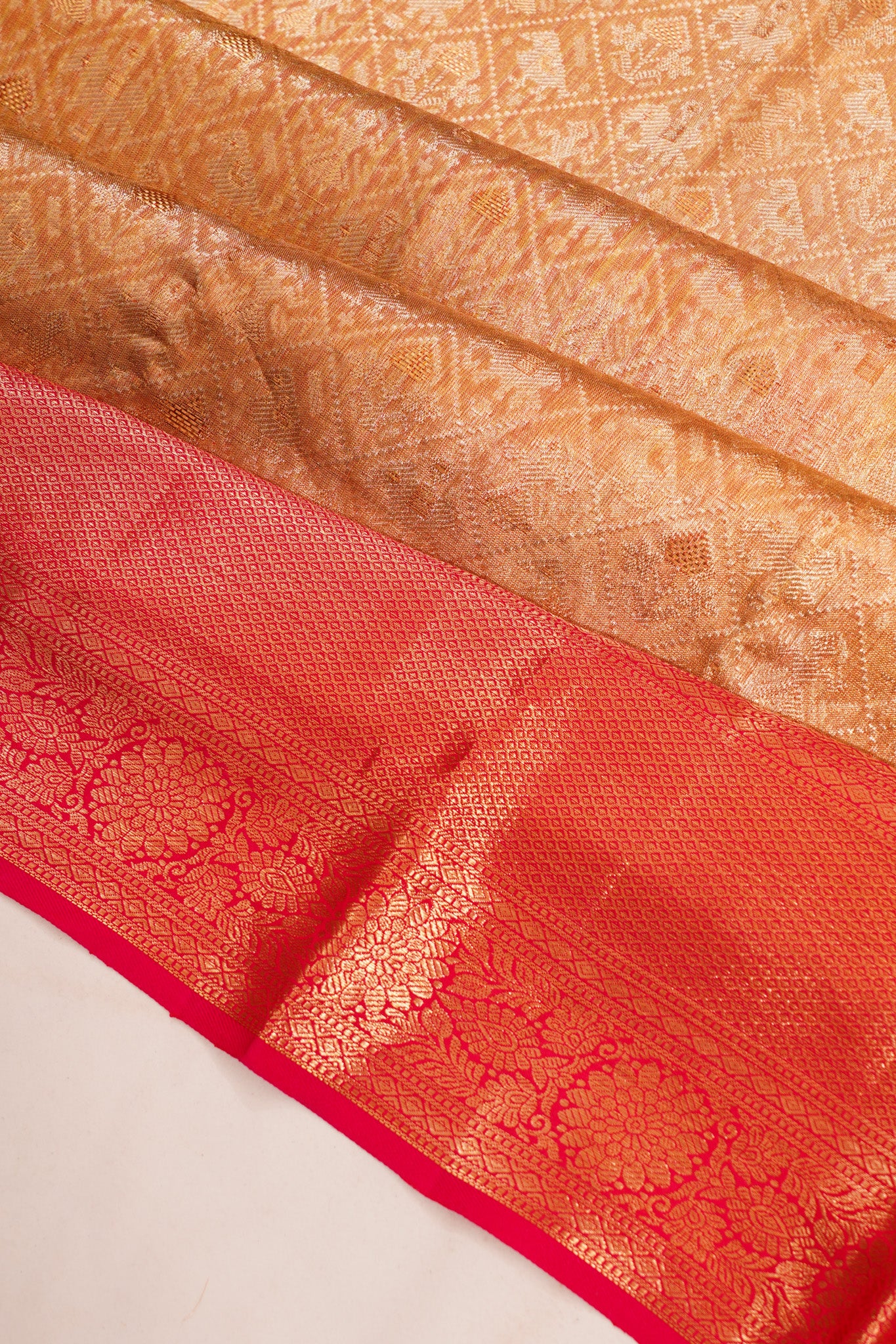 Taranga Kanchi Silk Tissue Brocade Gold Saree