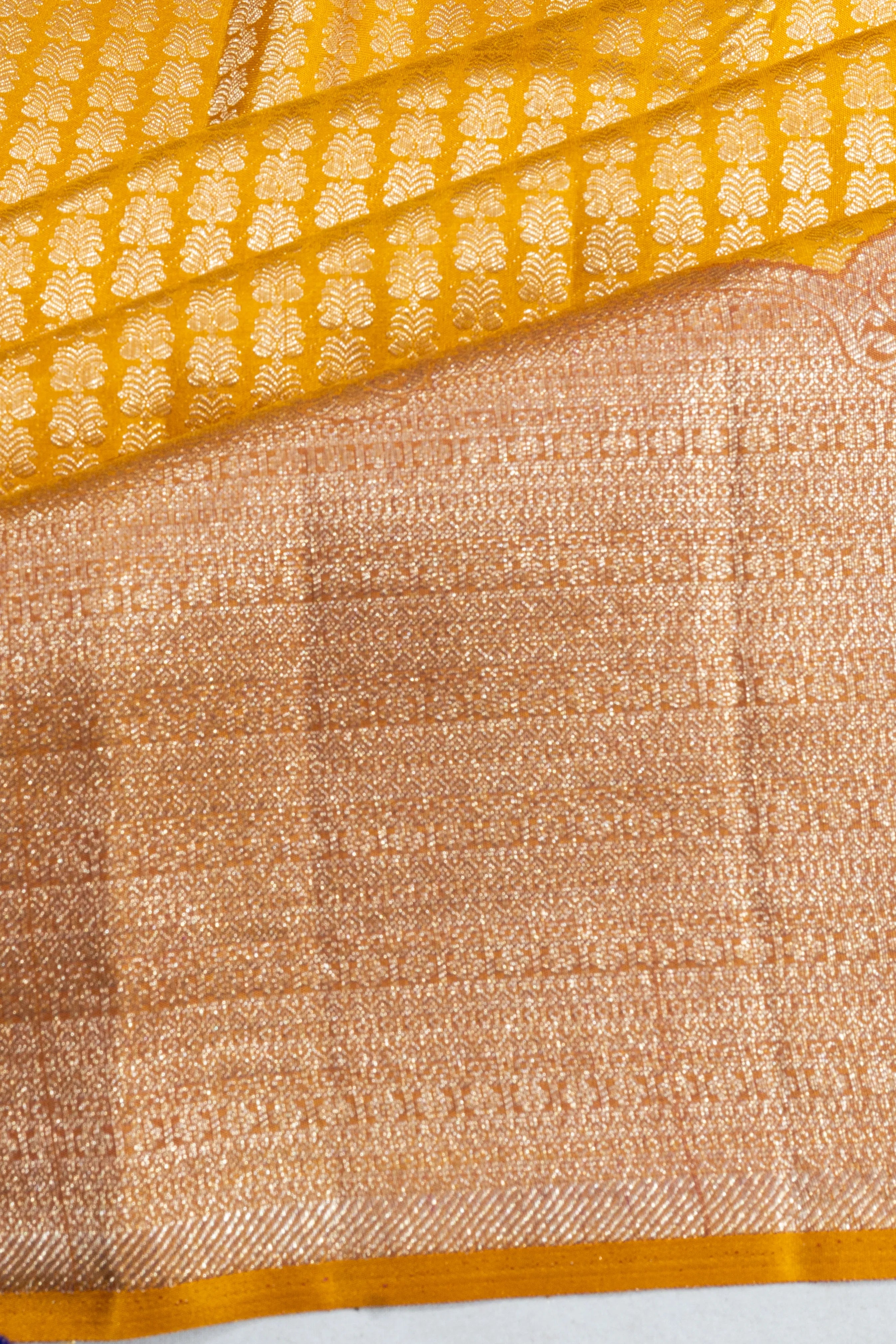 Taranga Kanchi Silk Tissue Brocade Yellow Saree