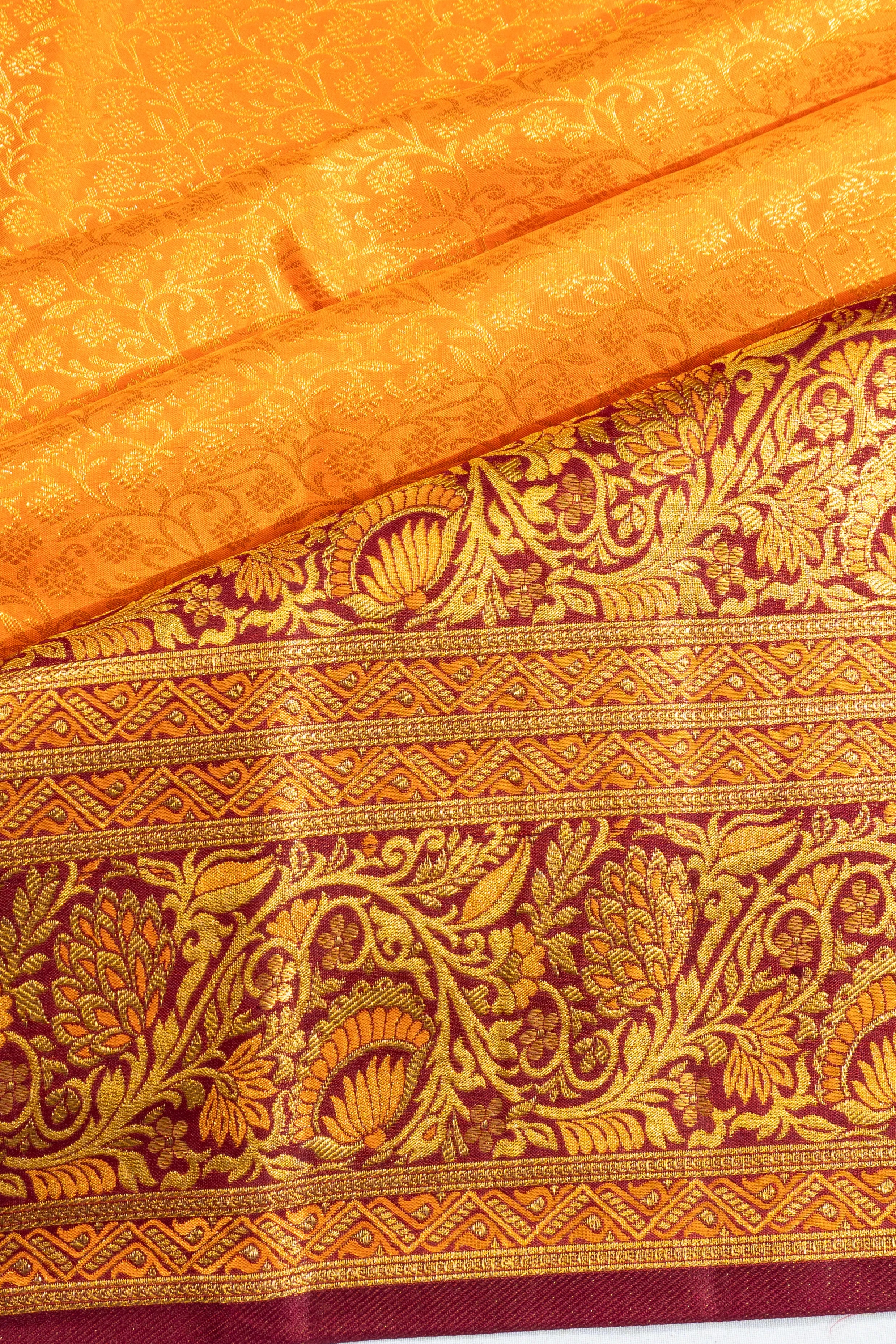 Taranga Kanchi Silk Brocade Orange Saree