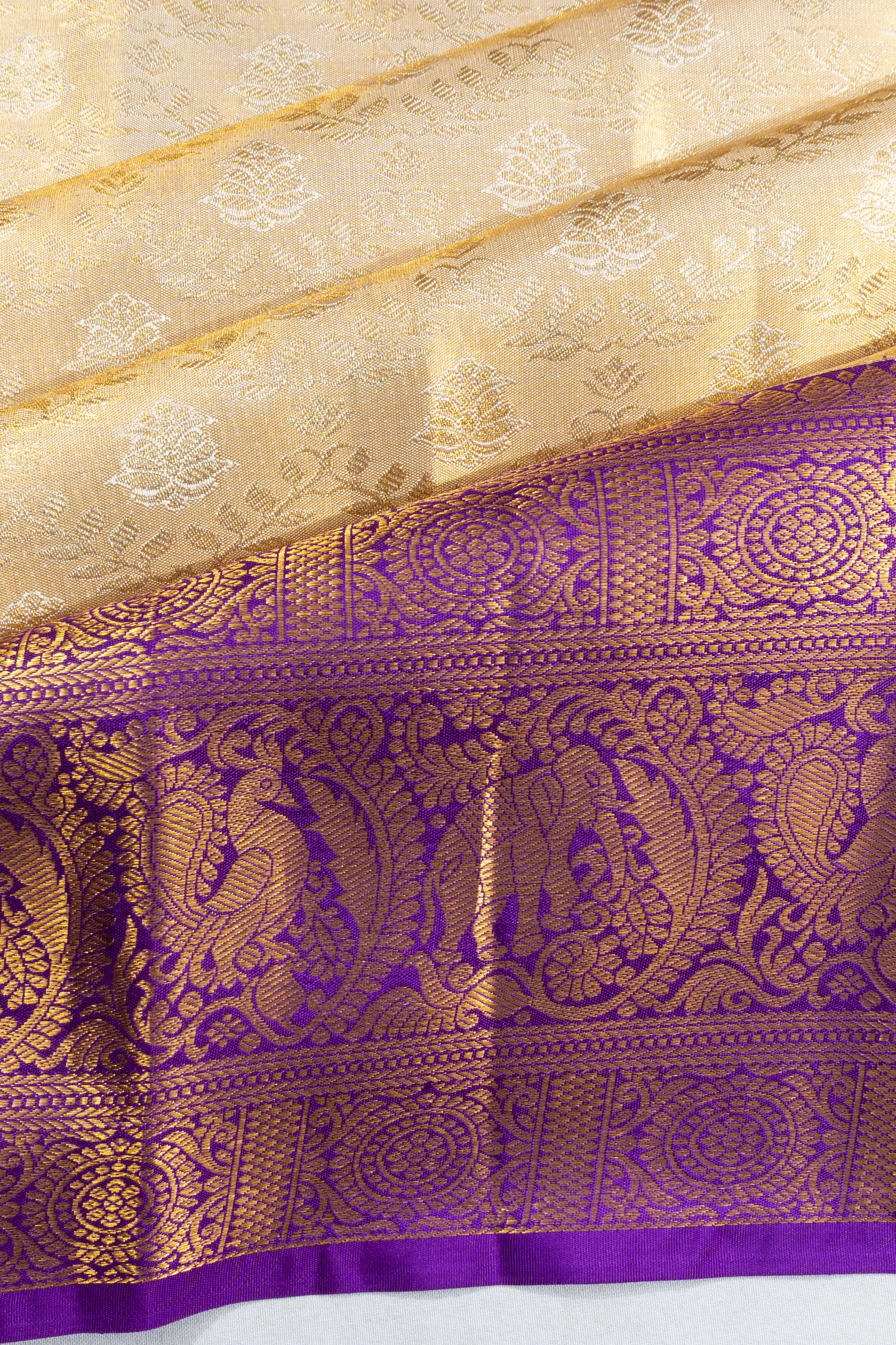 Taranga Kanchi Silk Tissue Brocade White Saree