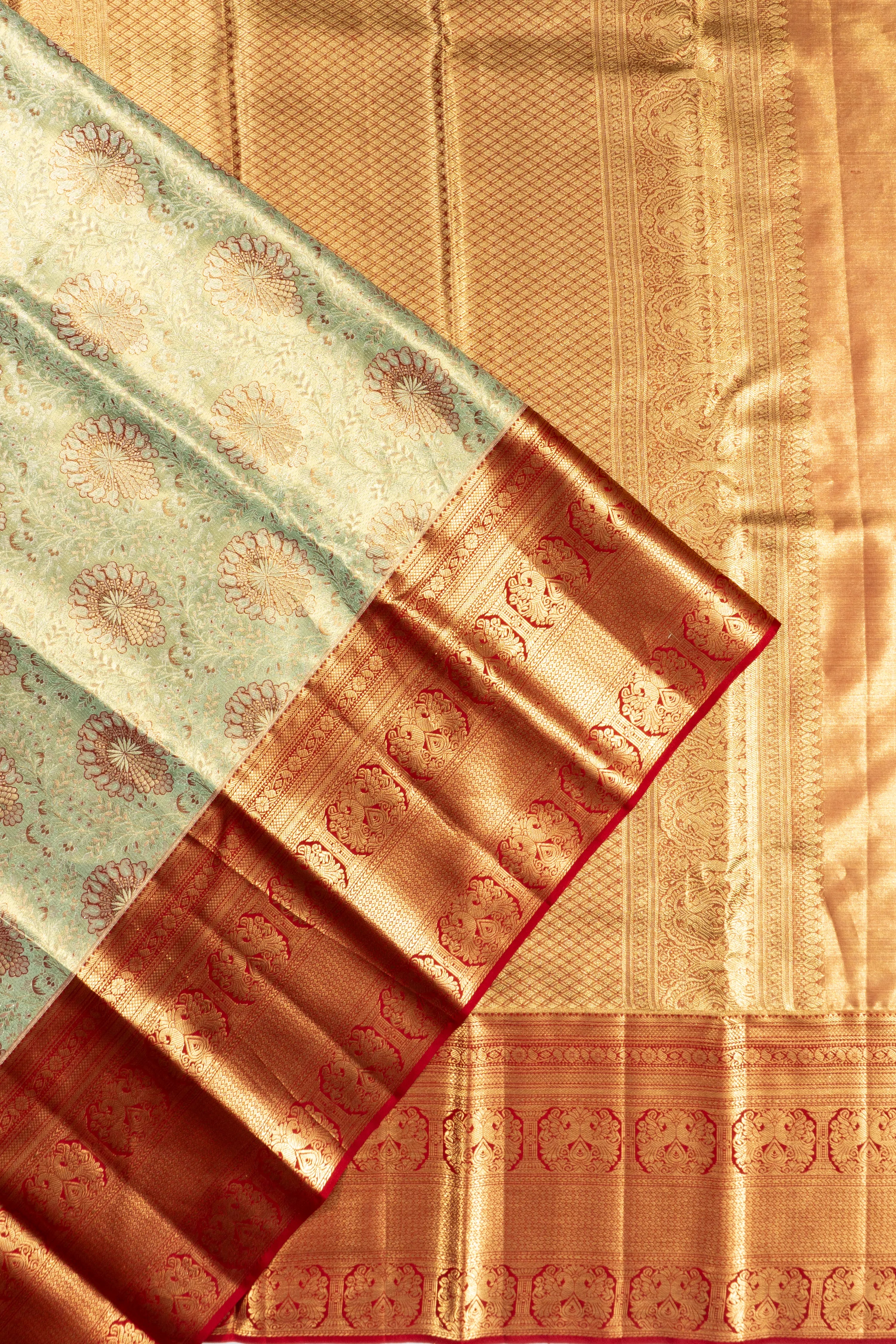 Taranga Kanchi Silk Tissue Brocade Pastel Green Saree