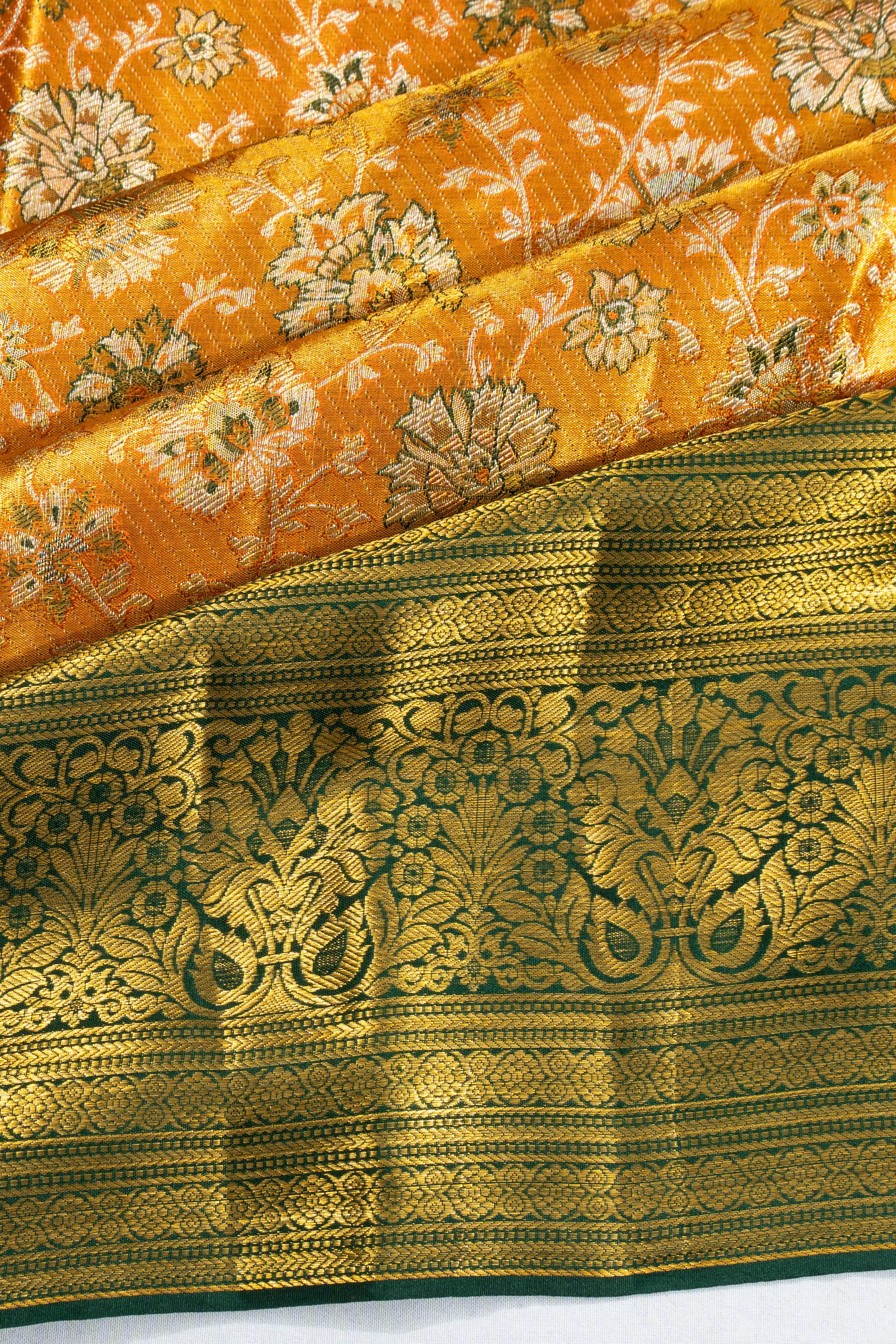 Taranga Kanchi Silk Tissue Brocade Orange Saree
