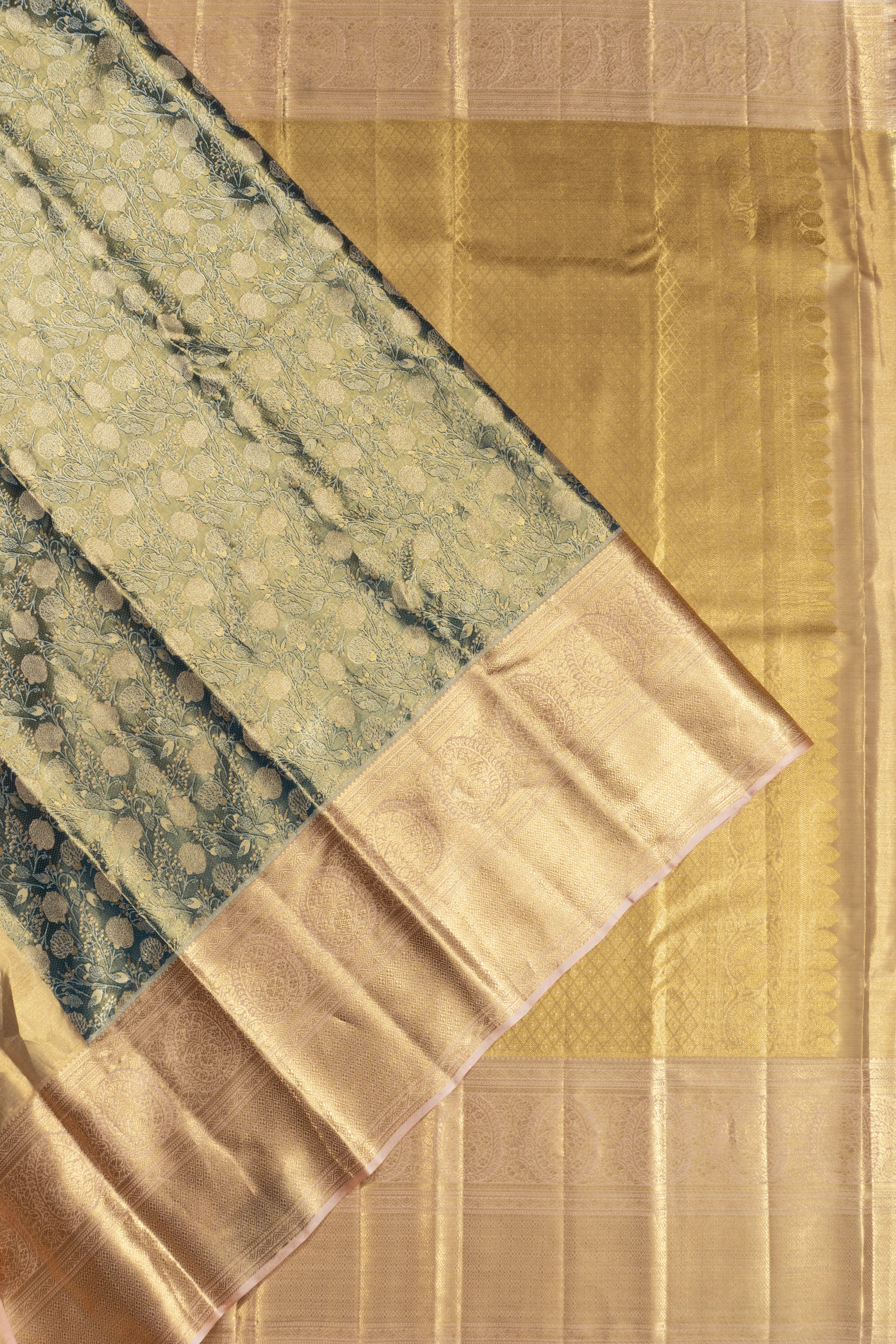 Taranga Kanchi Silk Tissue Brocade Green Saree