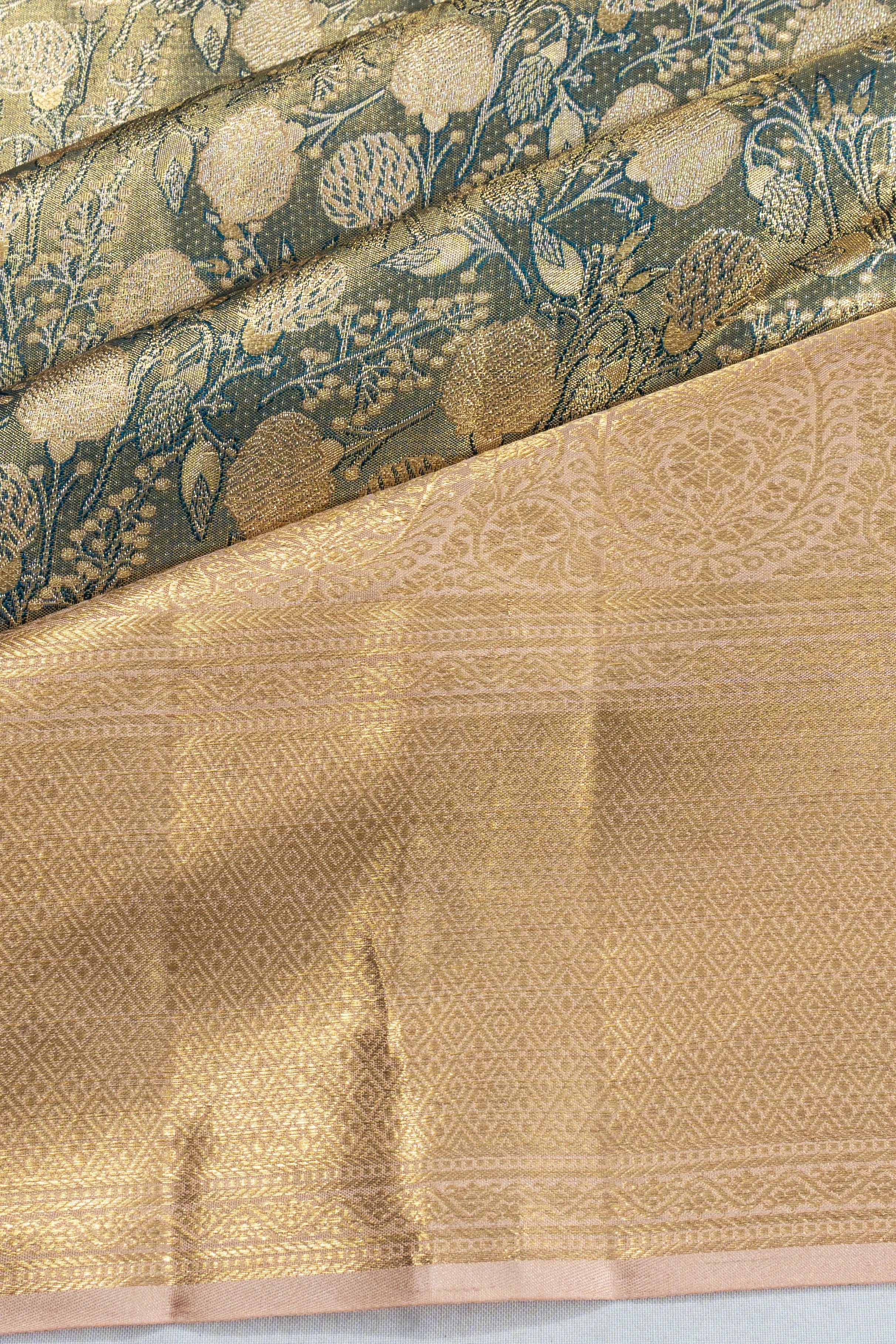 Taranga Kanchi Silk Tissue Brocade Green Saree