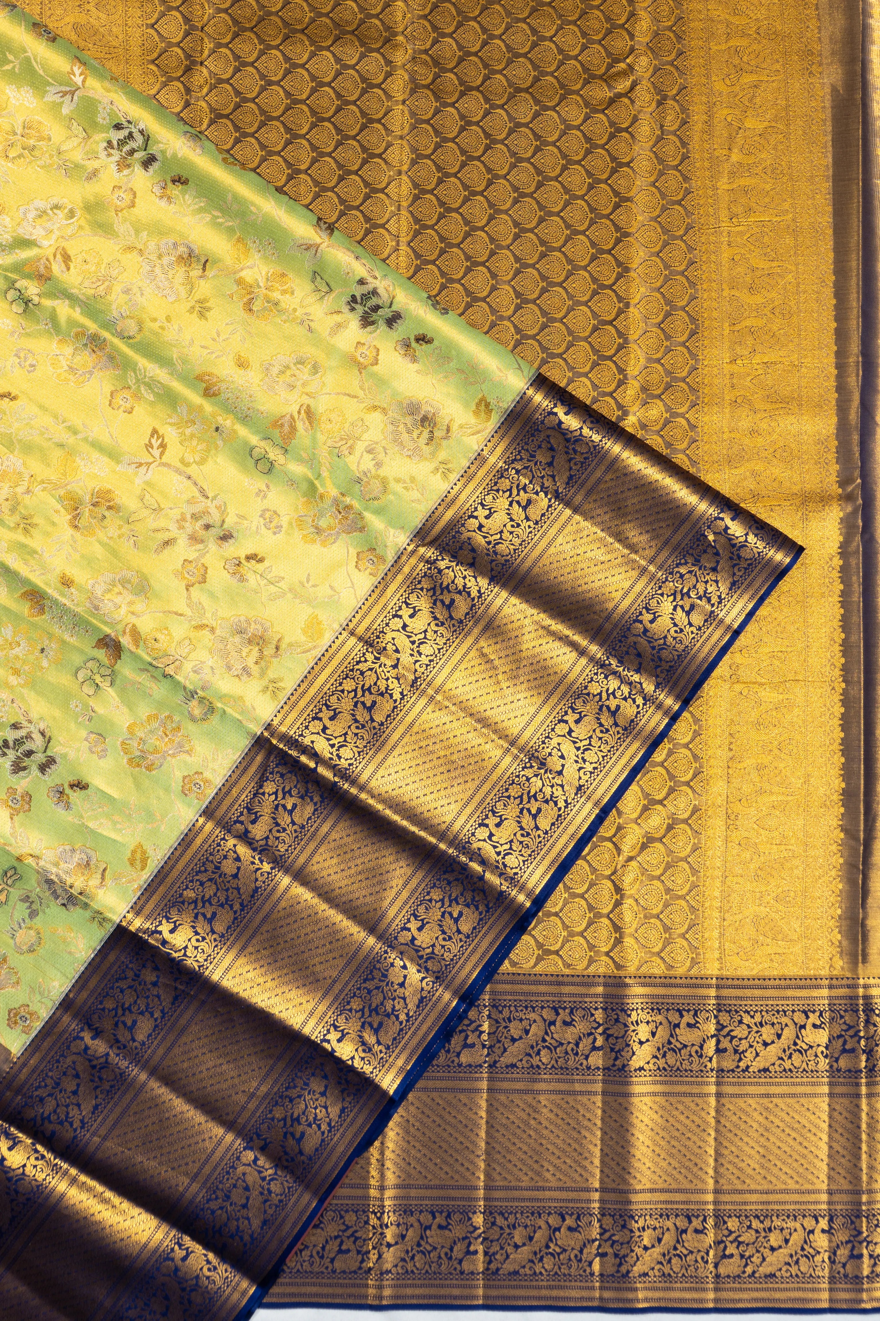 Taranga Kanchi Silk Tissue Brocade Green Saree
