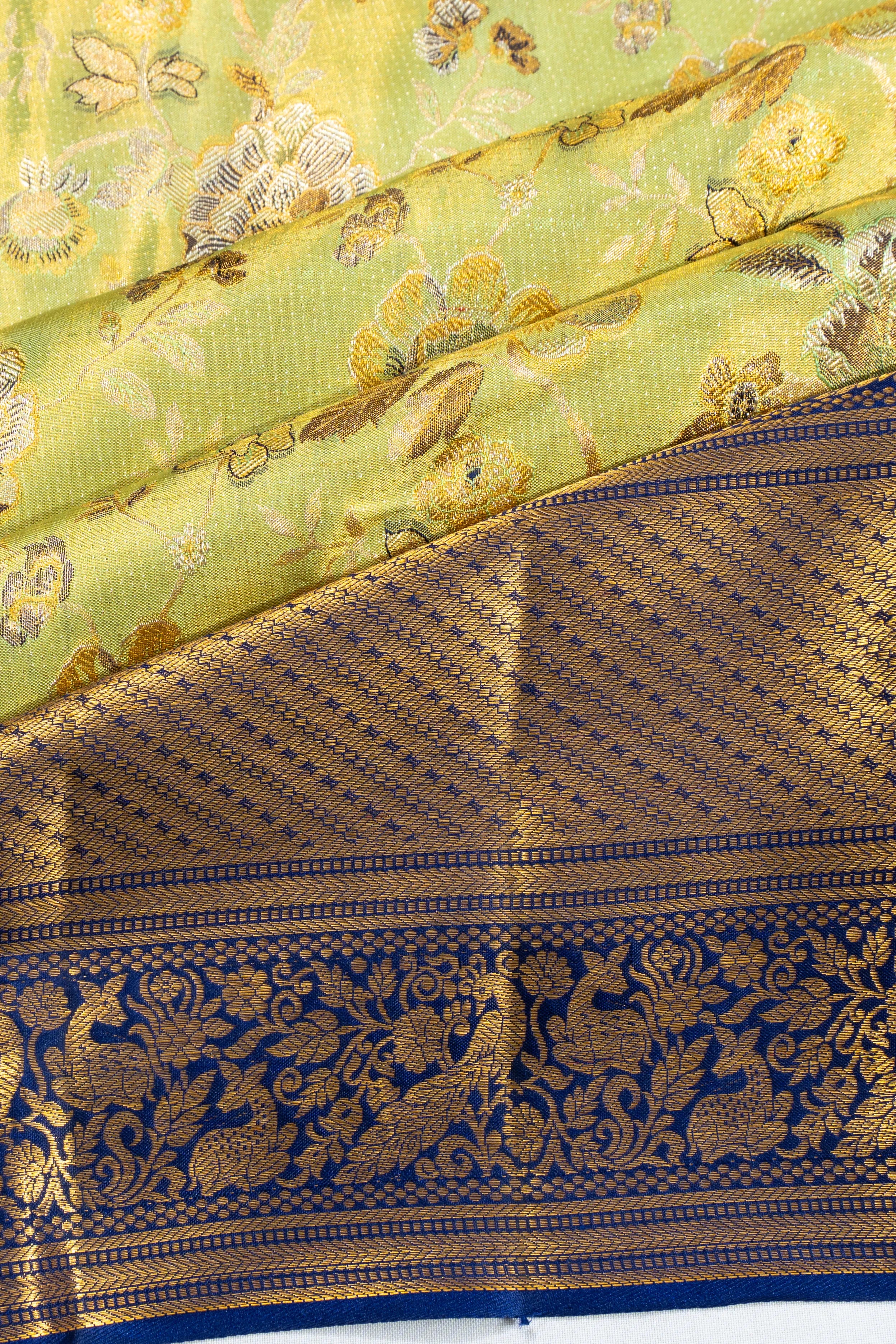 Taranga Kanchi Silk Tissue Brocade Green Saree