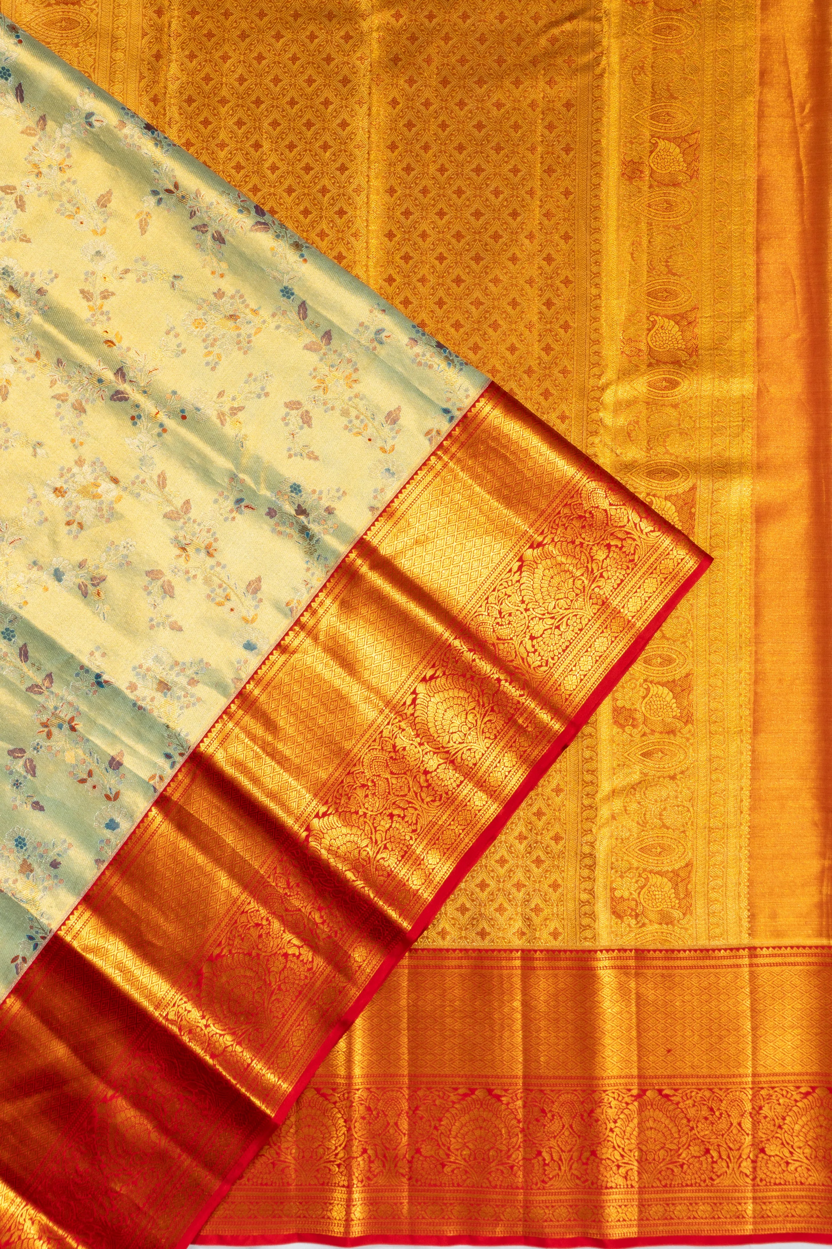 Taranga Kanchi Silk Tissue Brocade Green Saree