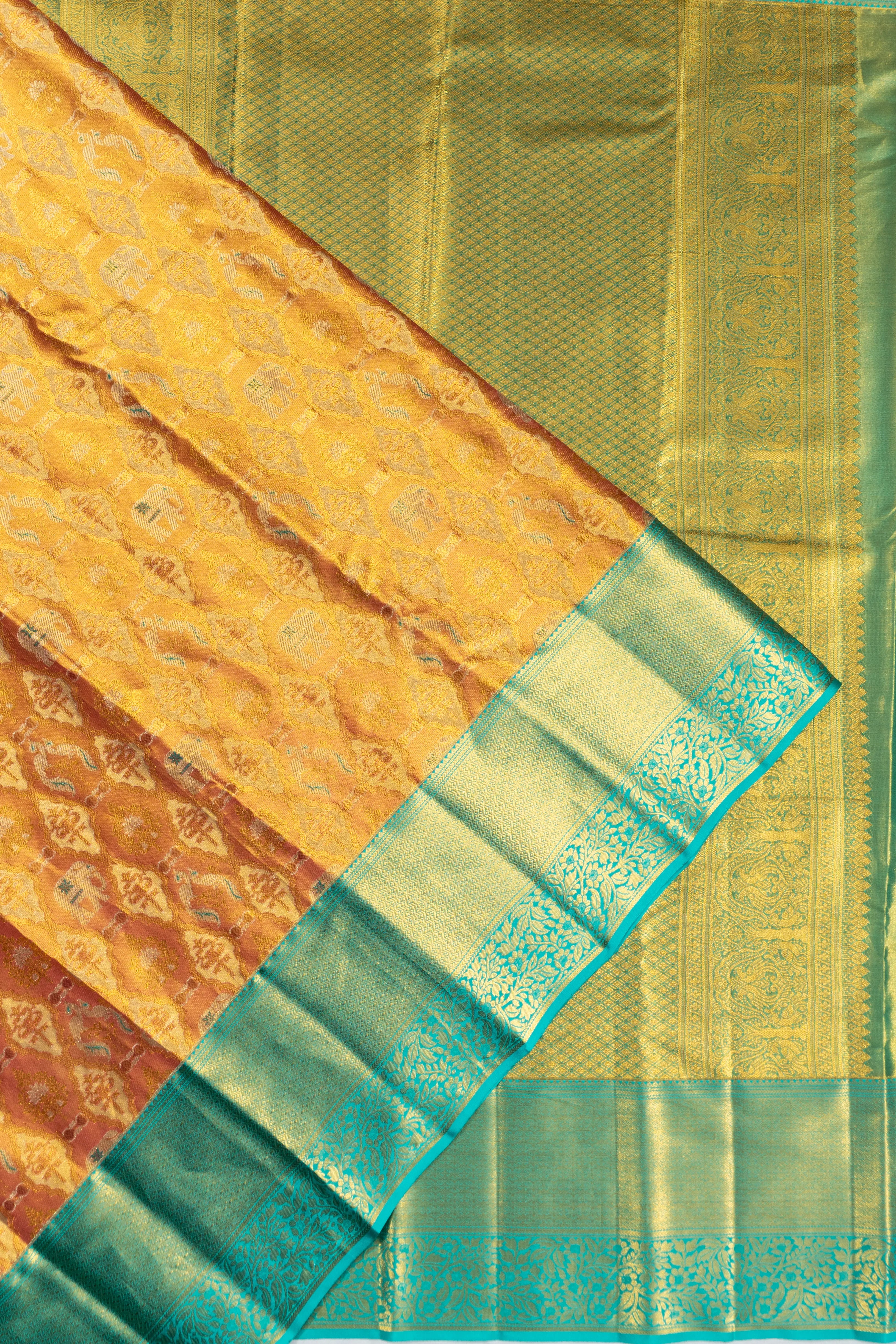 Taranga Kanchi Silk Tissue Brocade Orange Saree