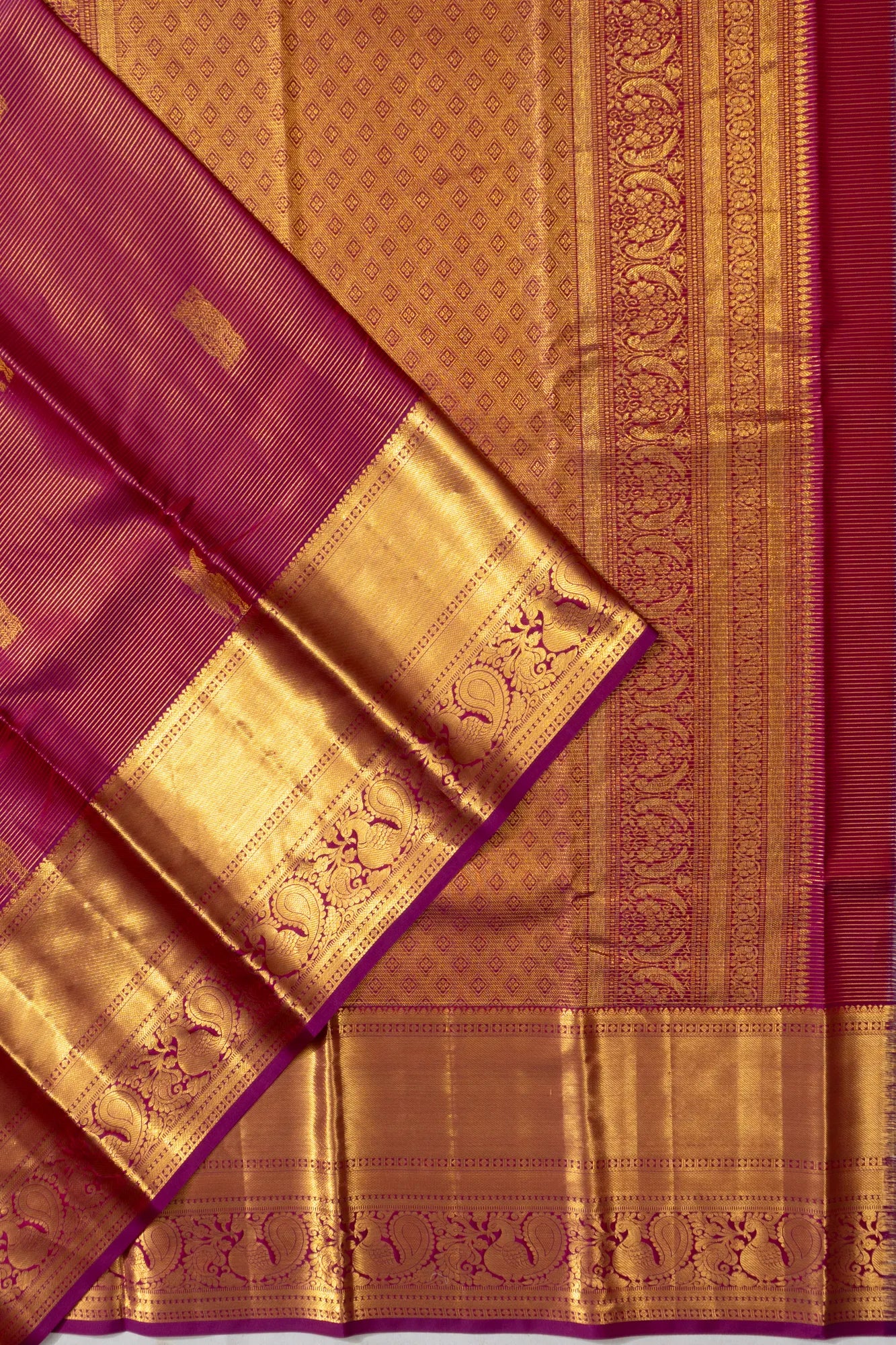 Taranga Kanchi Silk Oosi Line And Butta Purple Saree