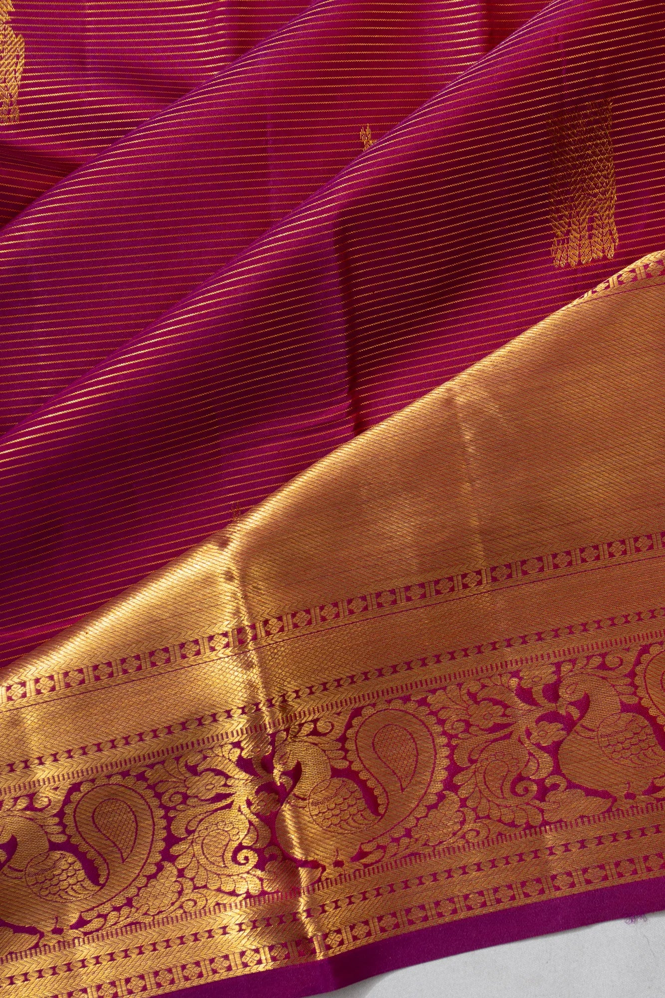 Taranga Kanchi Silk Oosi Line And Butta Purple Saree