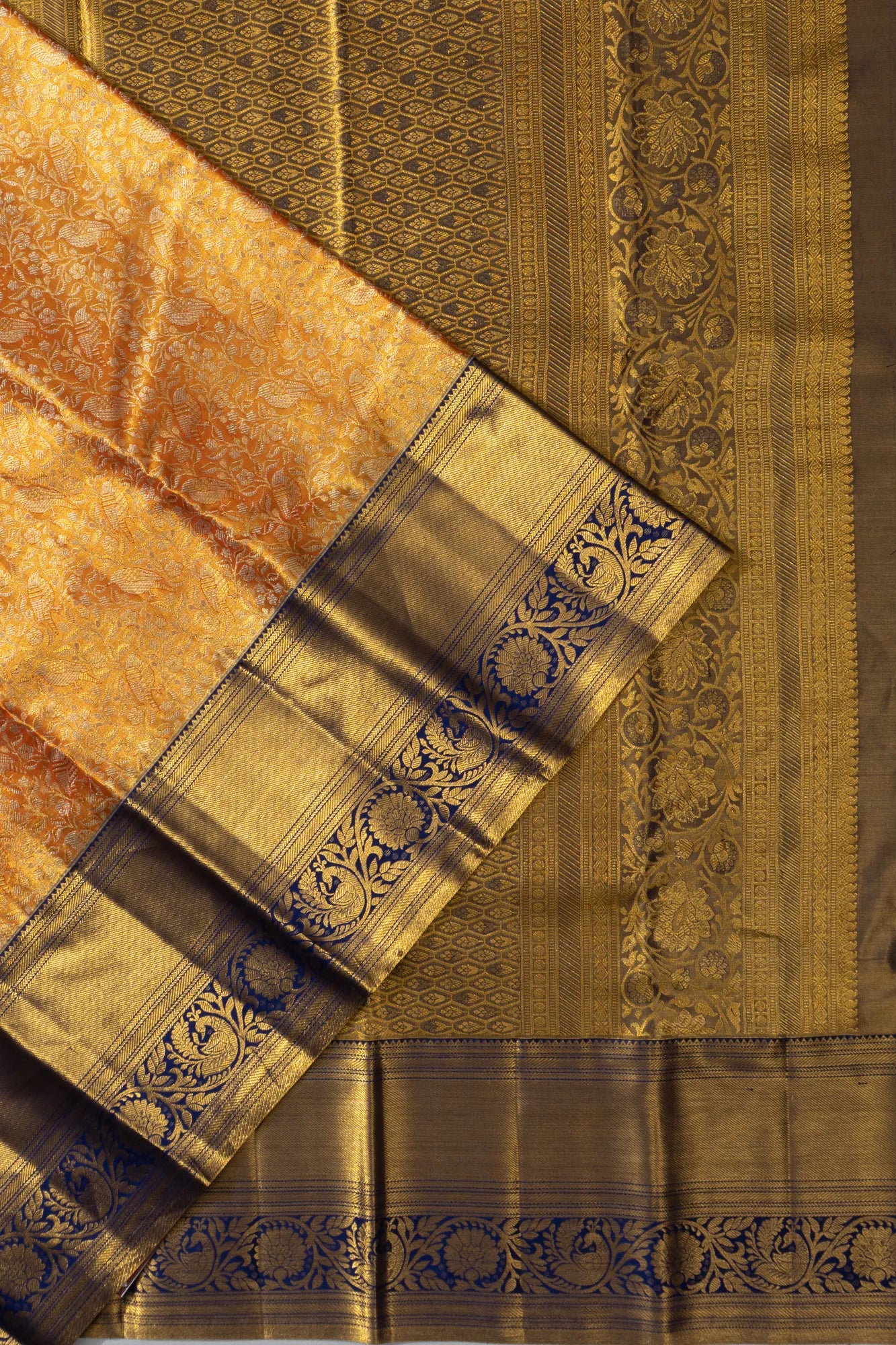 Taranga Kanchi Silk Tissue Brocade Gold Saree