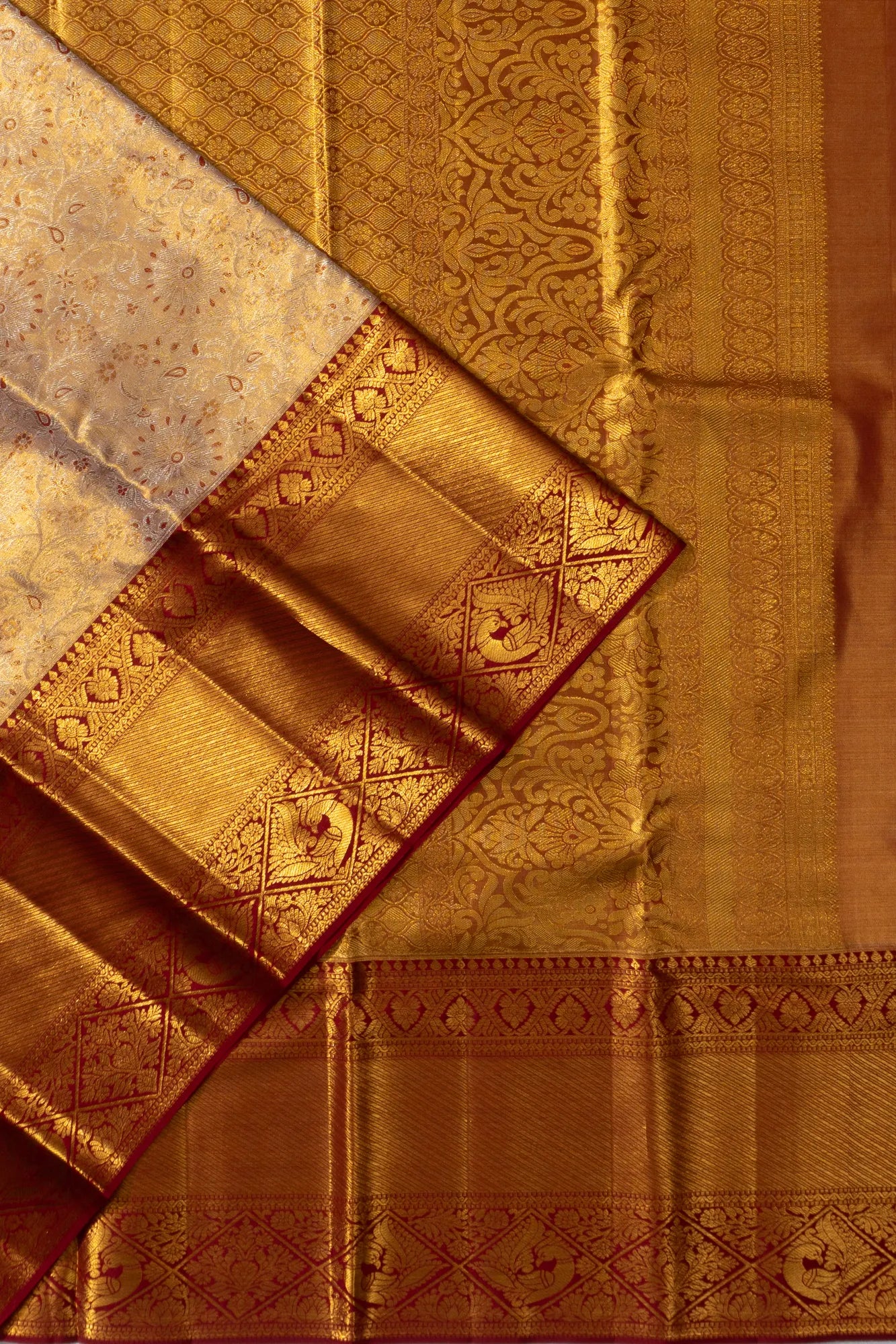 Taranga Kanchi Silk Tissue Brocade Gold Saree