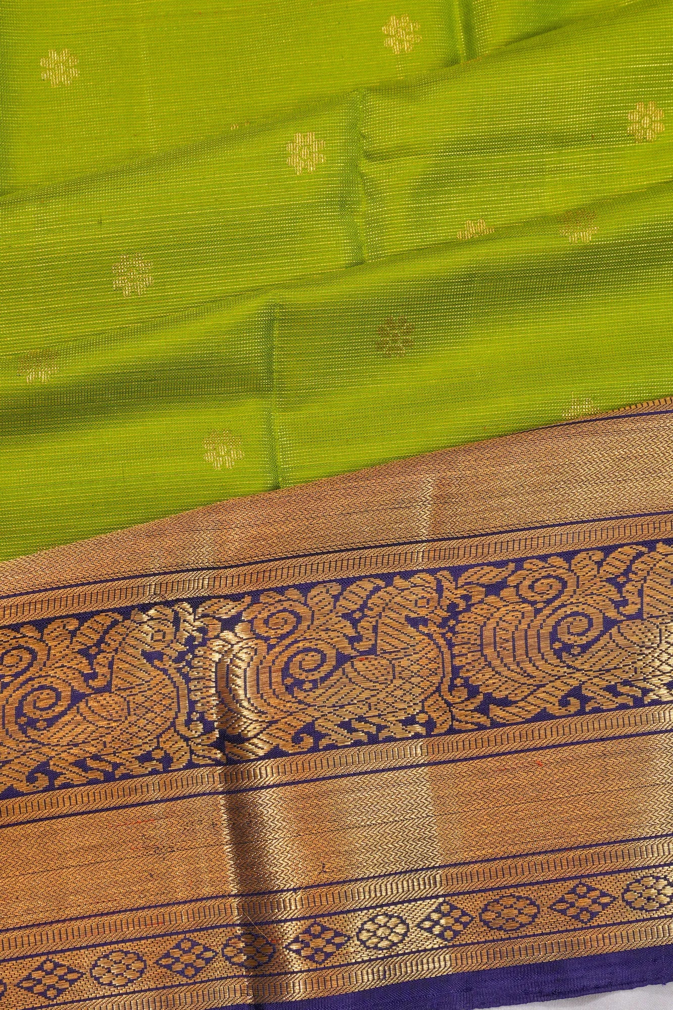 Kanchipuram Silk Oosi Lines And Butta Green Saree