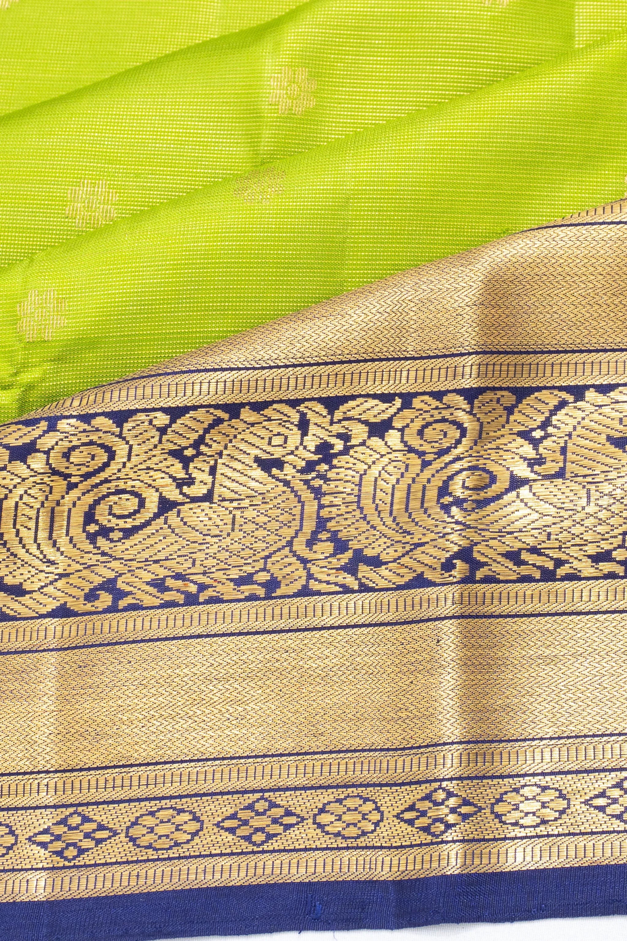 Classic Kanchipuram Silk Oosi Lines And Butta Parrot Green Saree