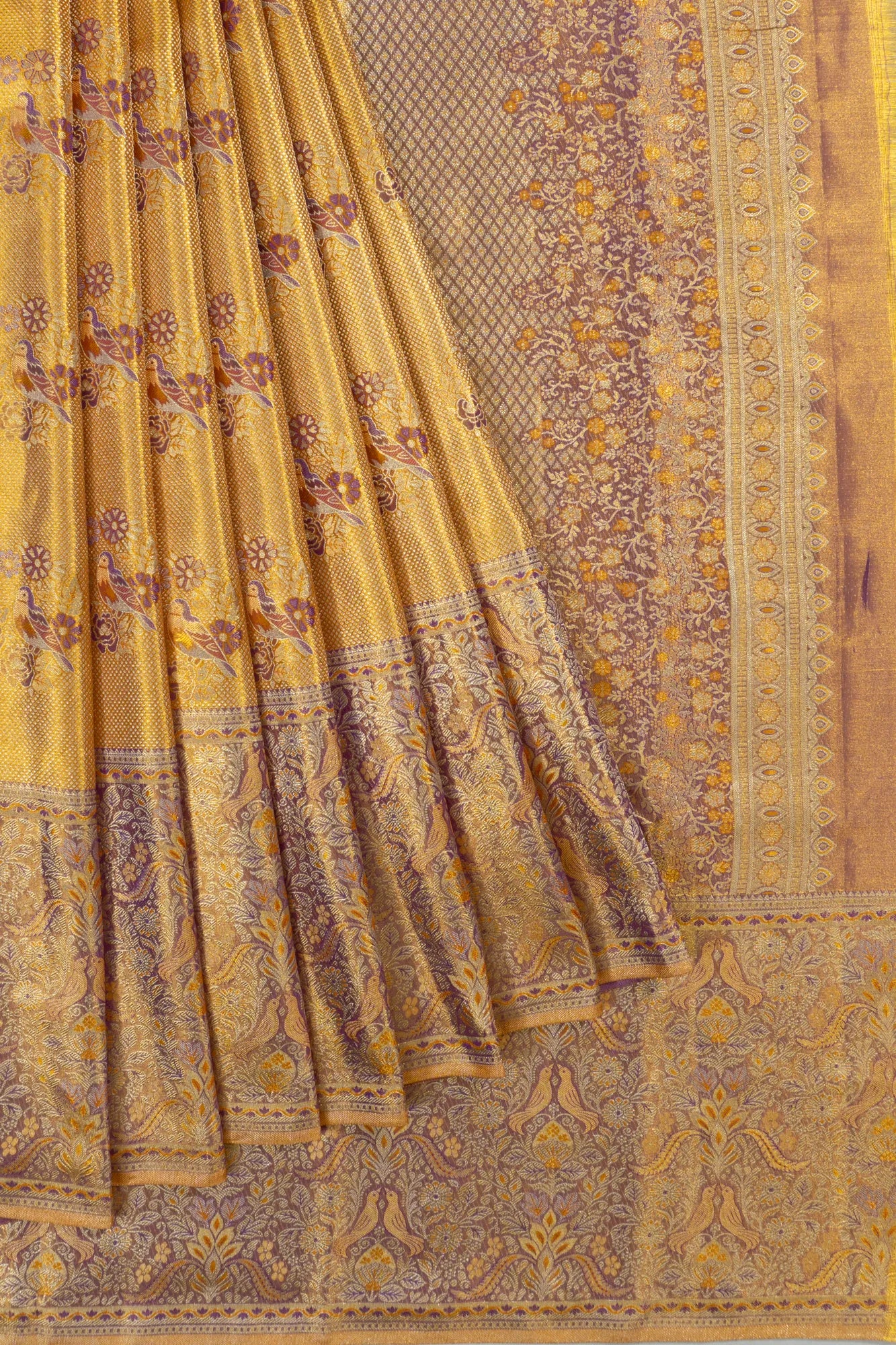 Taranga Kanchi Silk Tissue Brocade Gold Saree