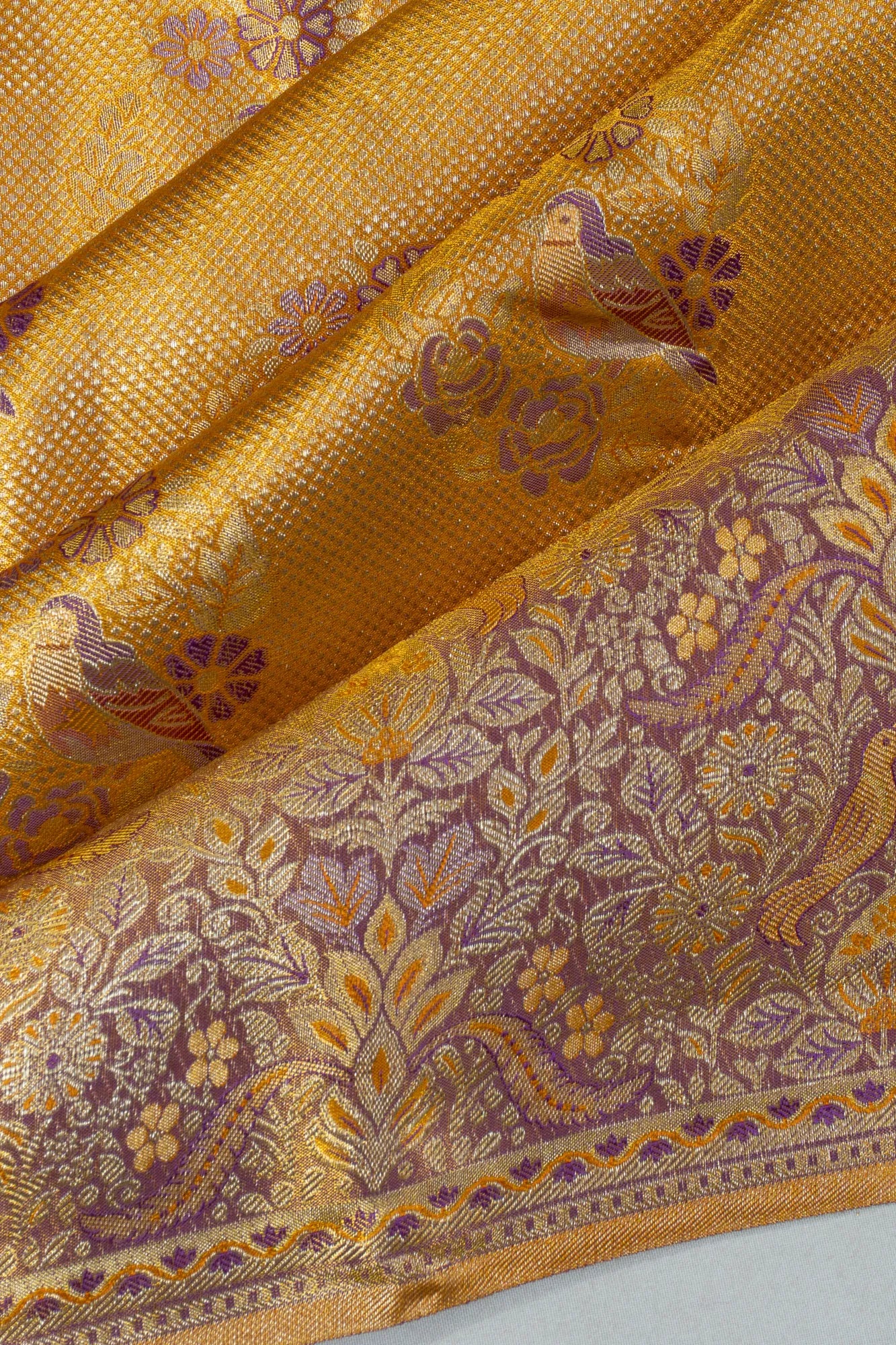 Taranga Kanchi Silk Tissue Brocade Gold Saree