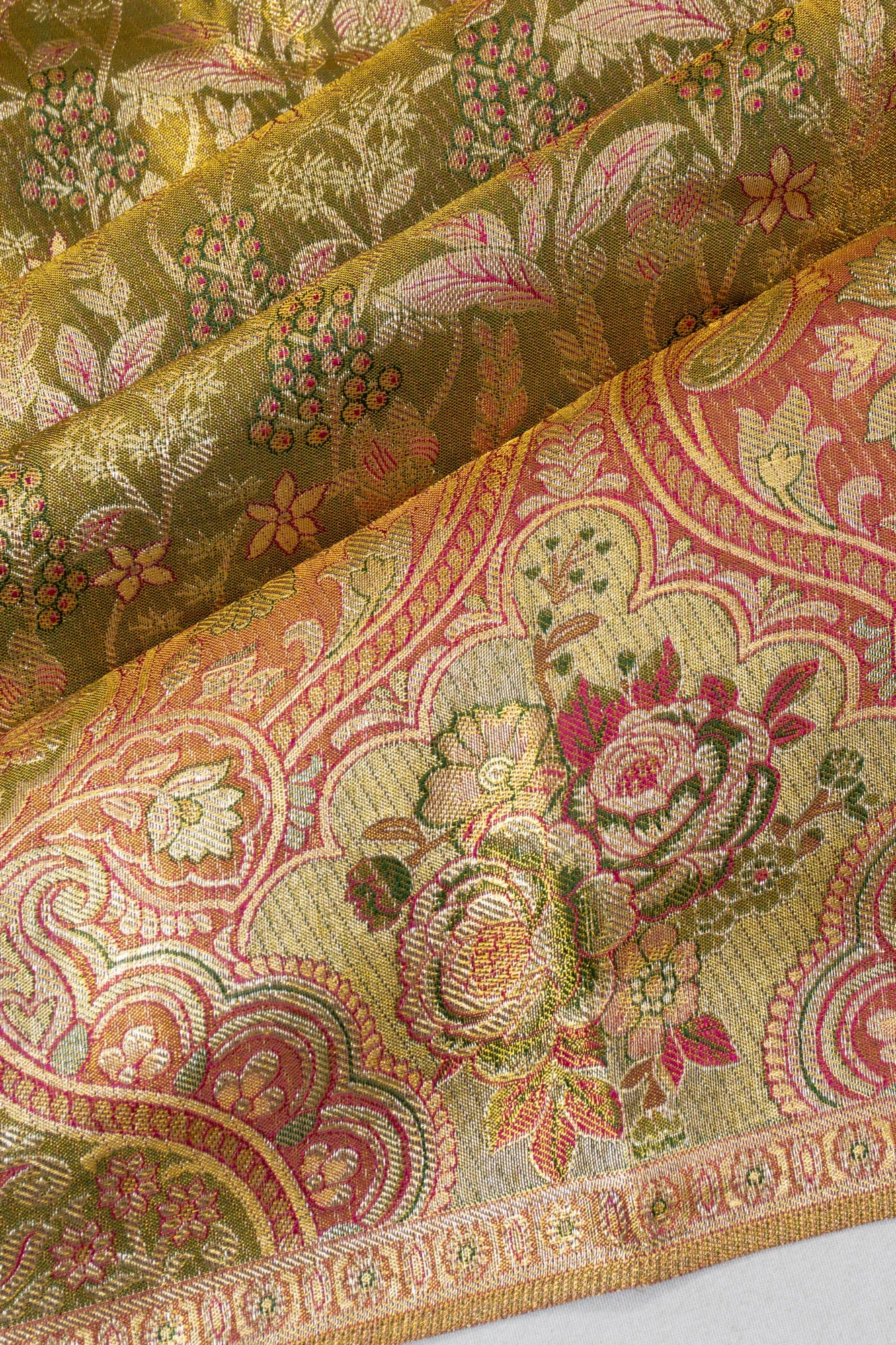 Taranga Kanchi Silk Tissue Brocade Green Saree