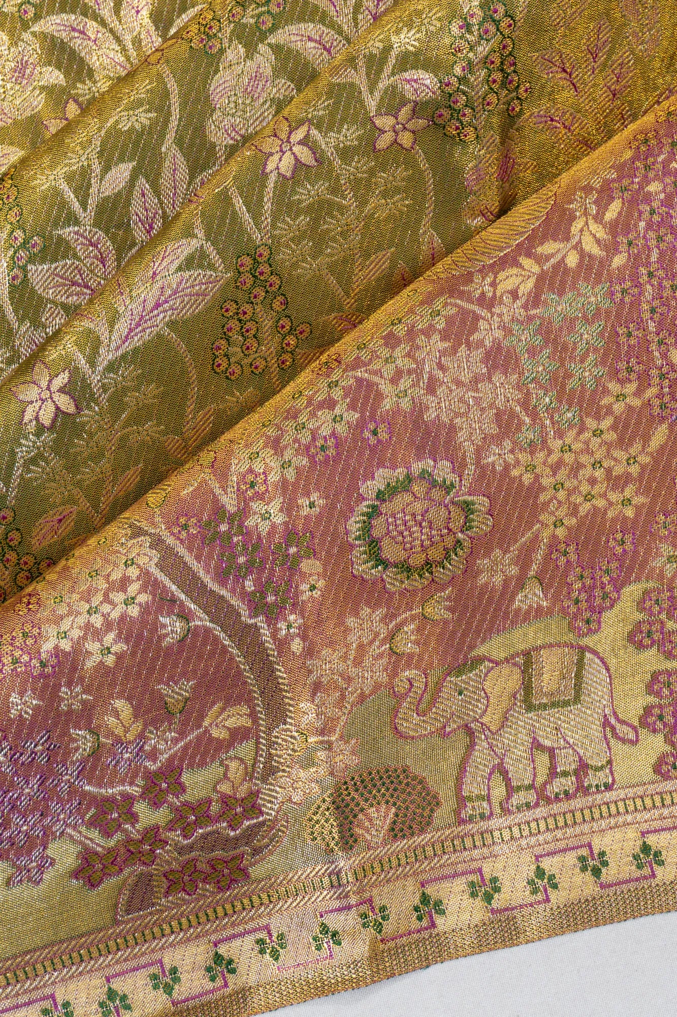 Taranga Kanchi Silk Tissue Brocade Green Saree